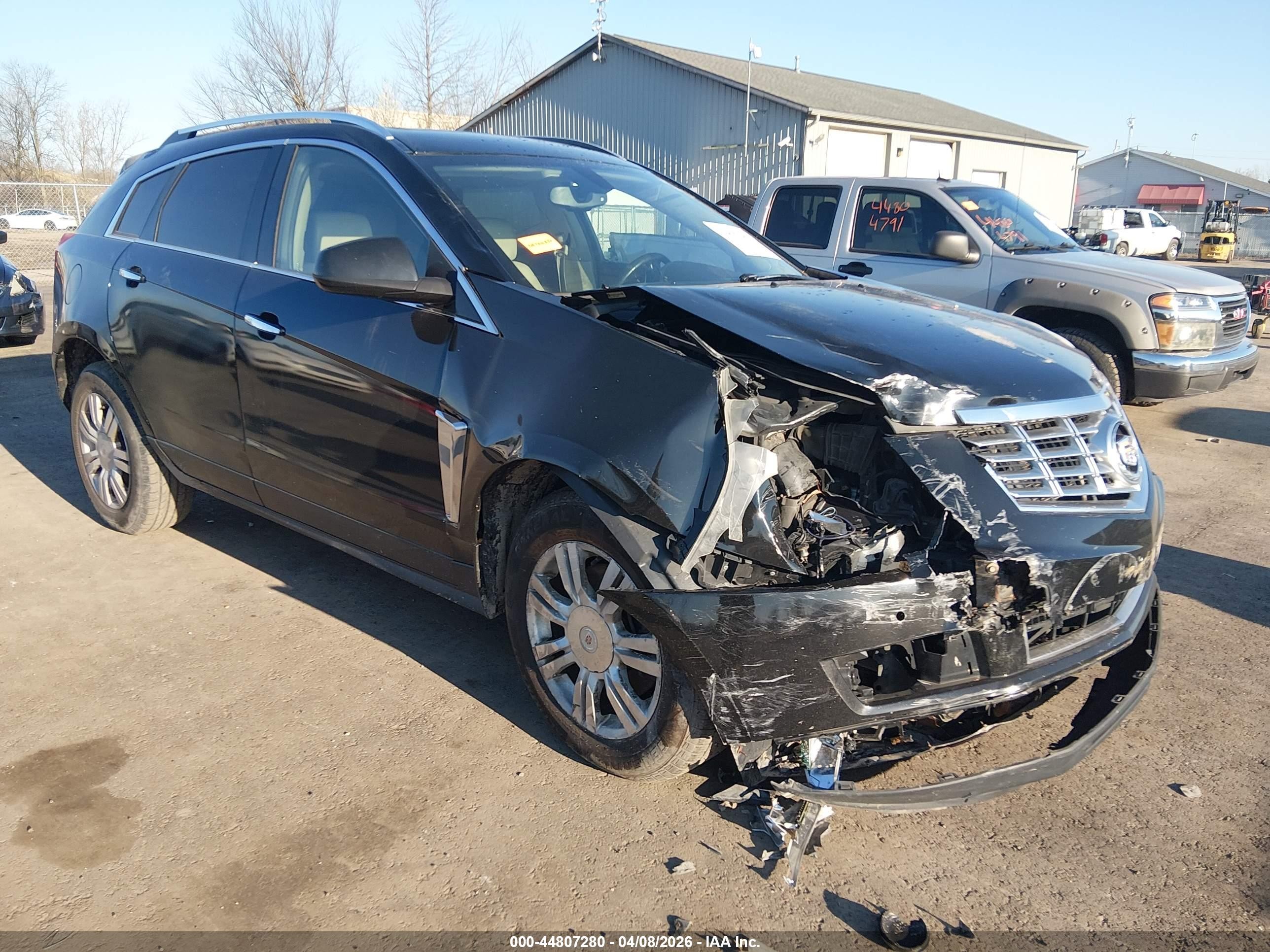 2013 Cadillac SRX Luxury Collection, VIN 3GYFNCE32DS539955 — Front end