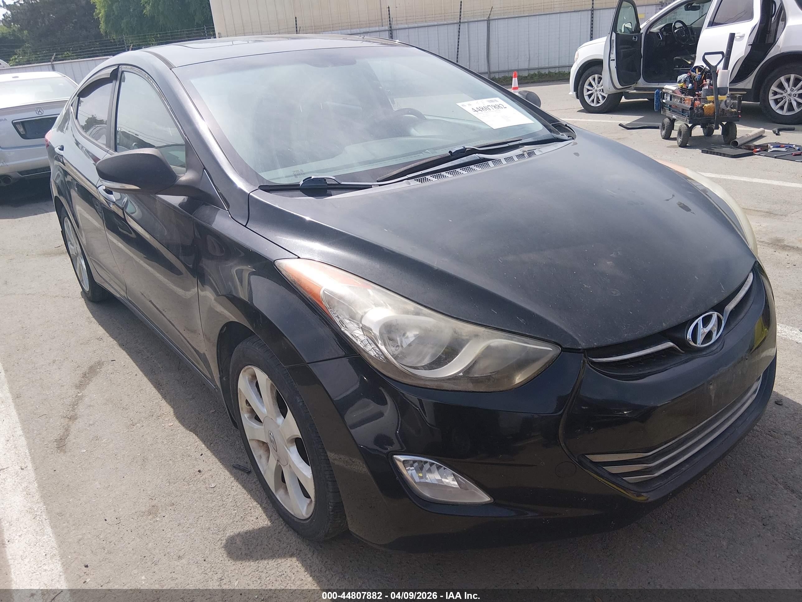 2011 Hyundai Elantra Limited, VIN 5NPDH4AE9BH037212 — Side