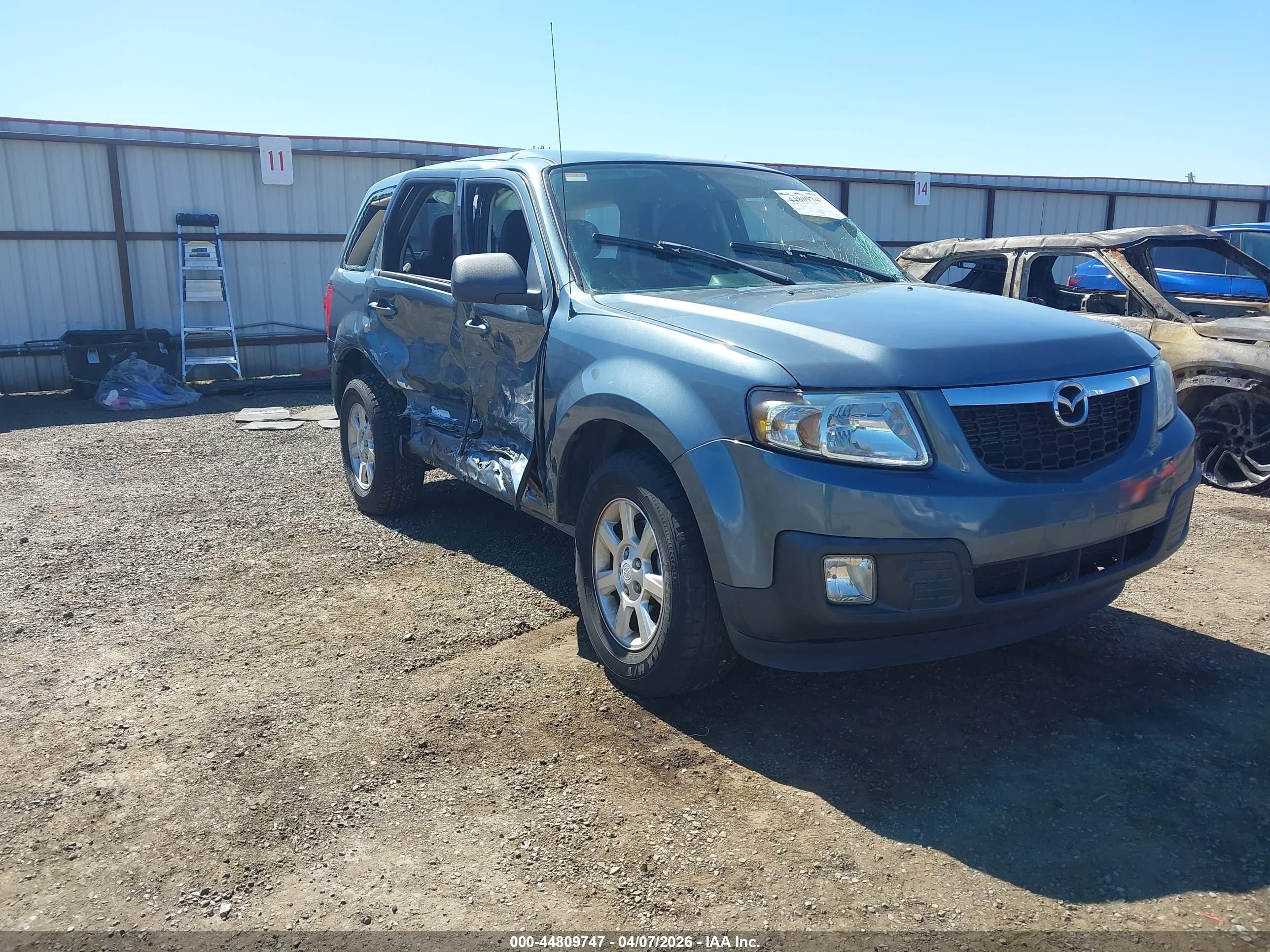 2011 Mazda Tribute Touring, VIN 4F2CY9C74BKM07457 — Опрокидывание