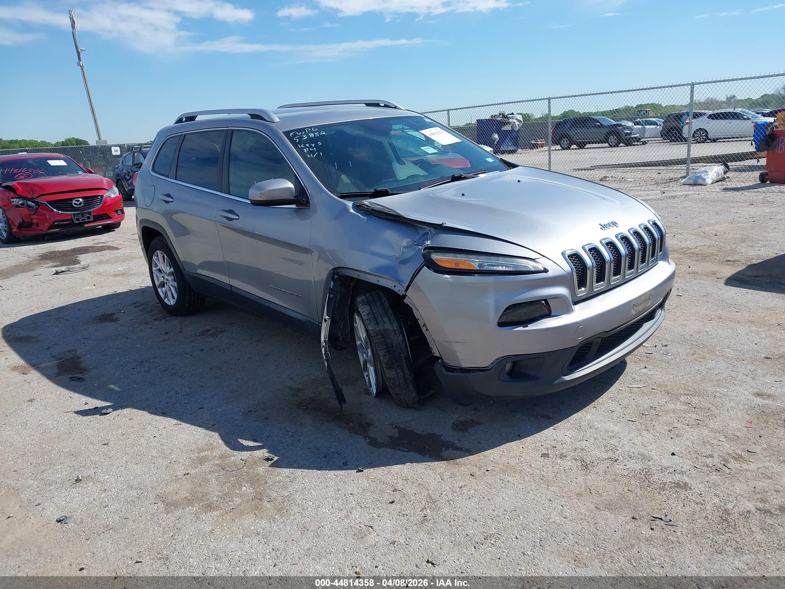 2014 Jeep Cherokee Altitude, VIN 1C4PJLCB9EW172199 — Бок
