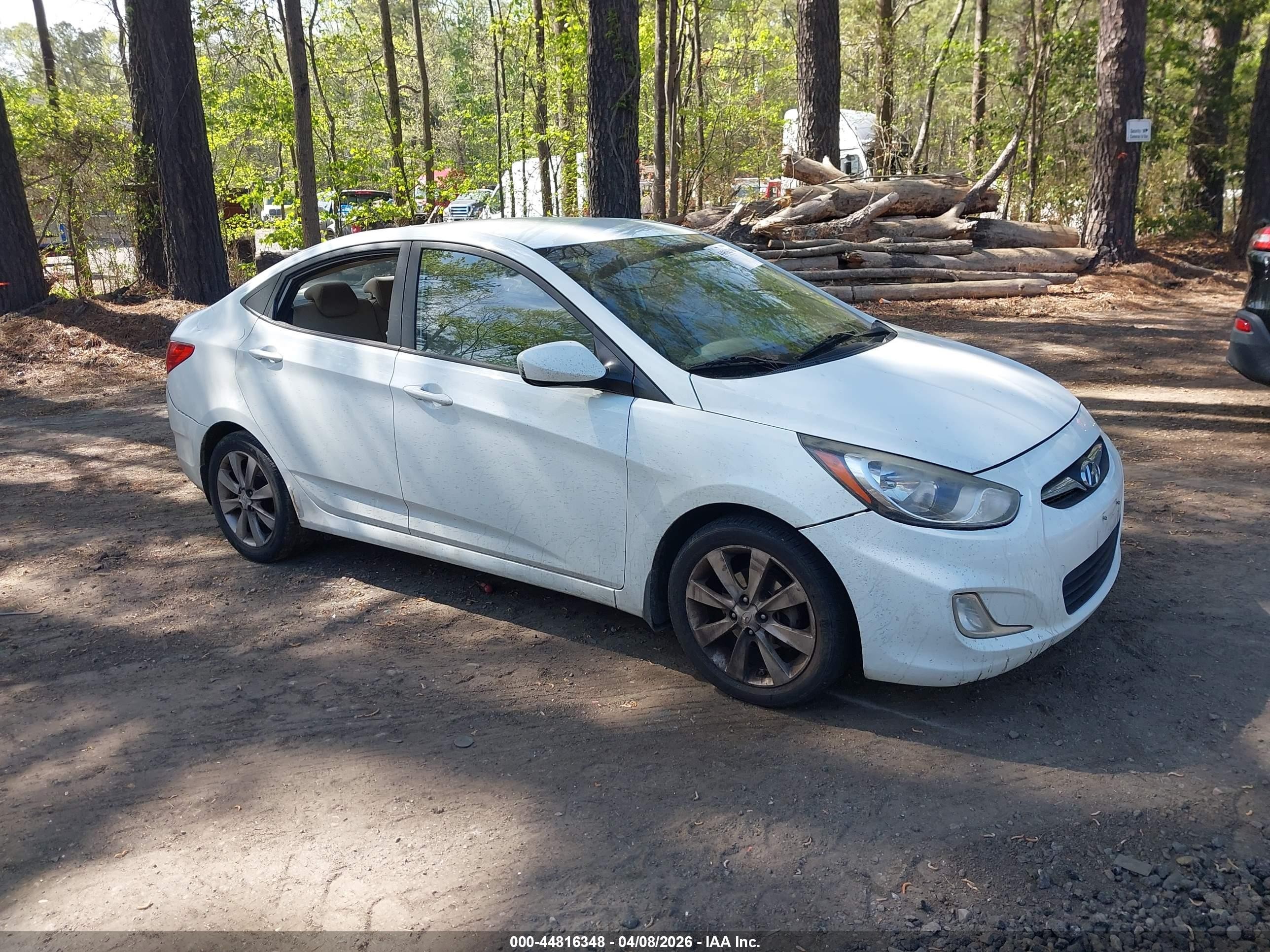 2012 Hyundai Accent GLS, VIN KMHCU4AE9CU264068 — Vandalism