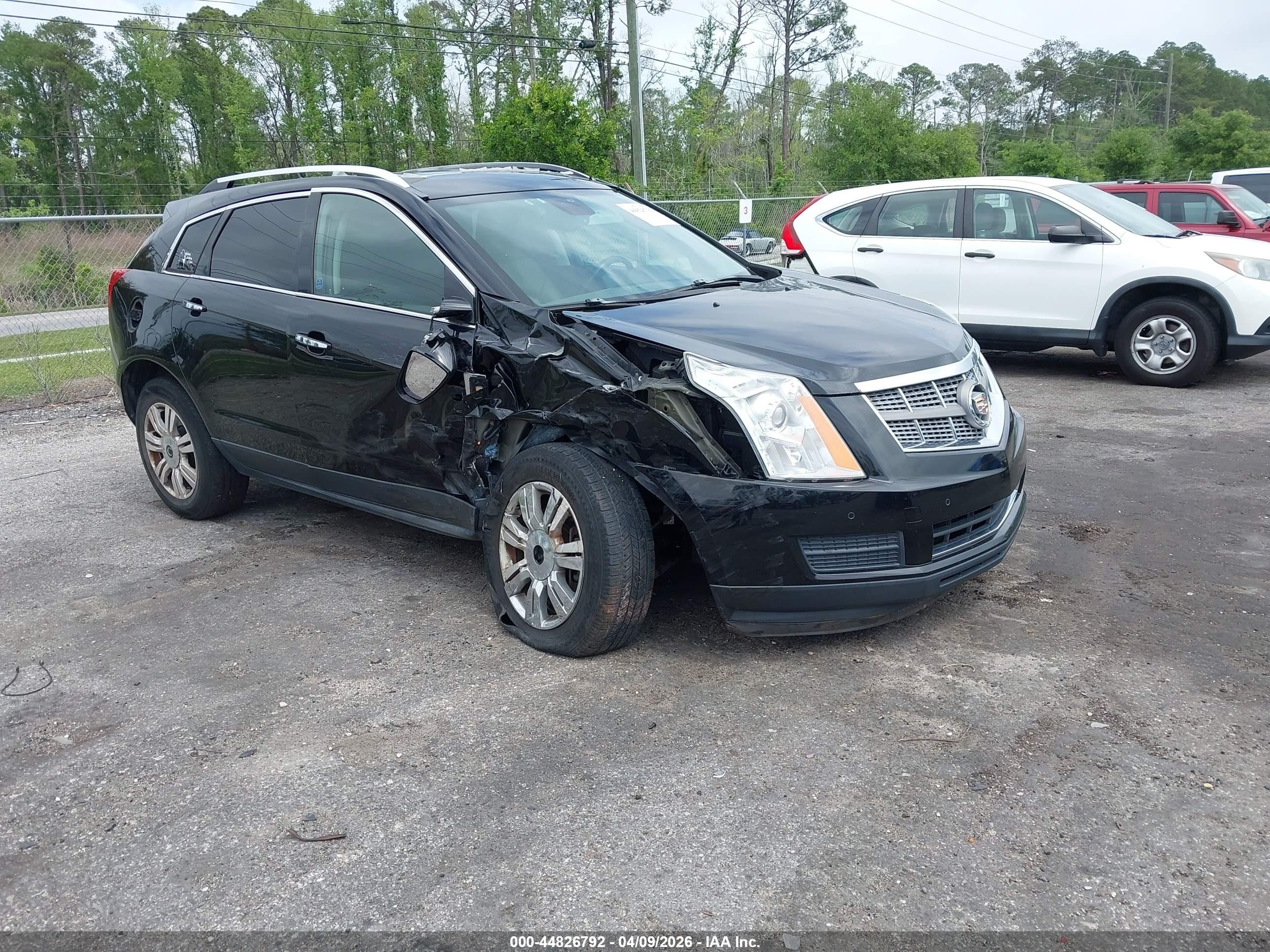 2011 Cadillac SRX Luxury Collection, VIN 3GYFNAEY4BS574588 — Front end
