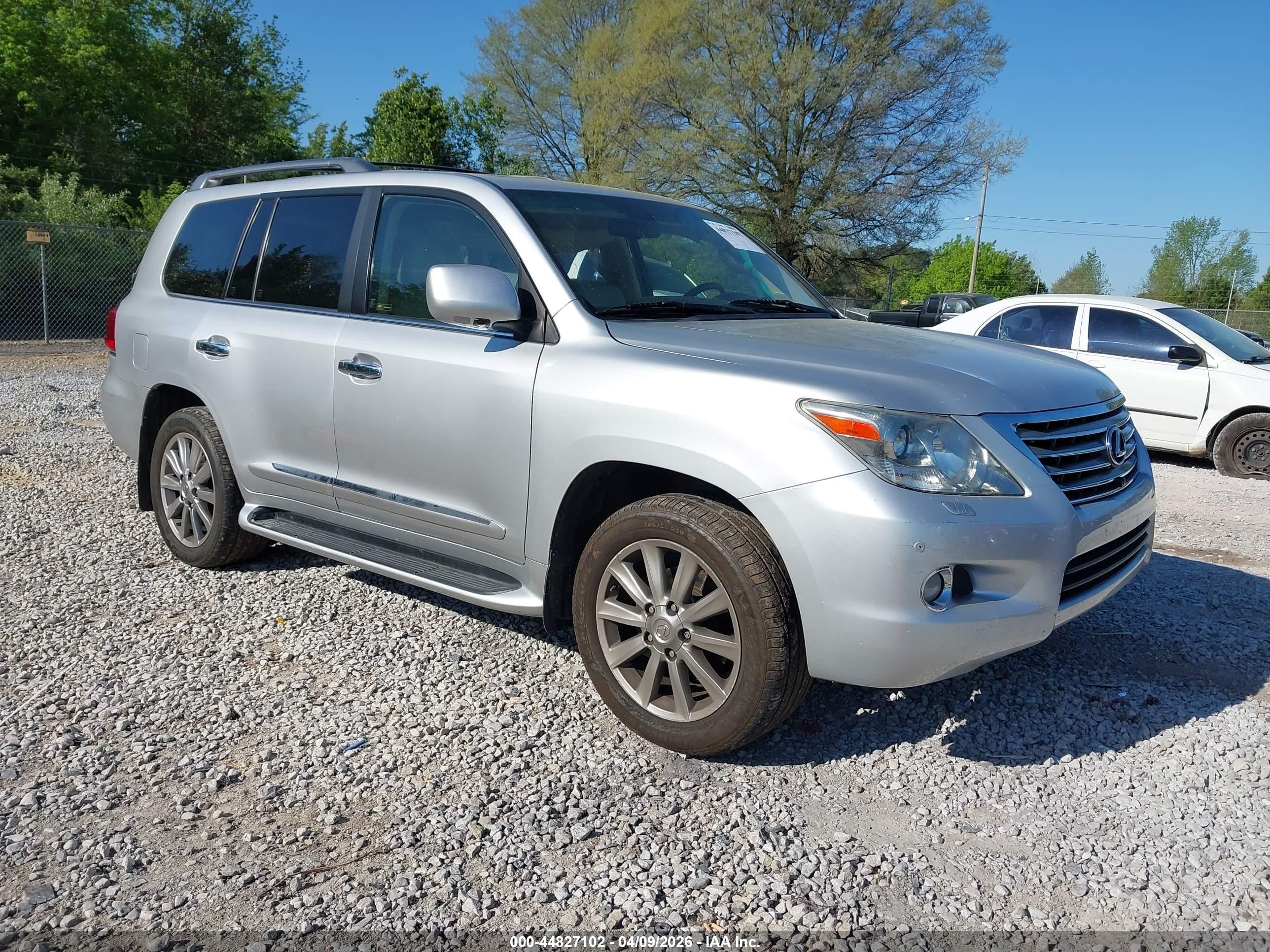 2011 Lexus LX 570, VIN JTJHY7AX9B4056835 — Rear end