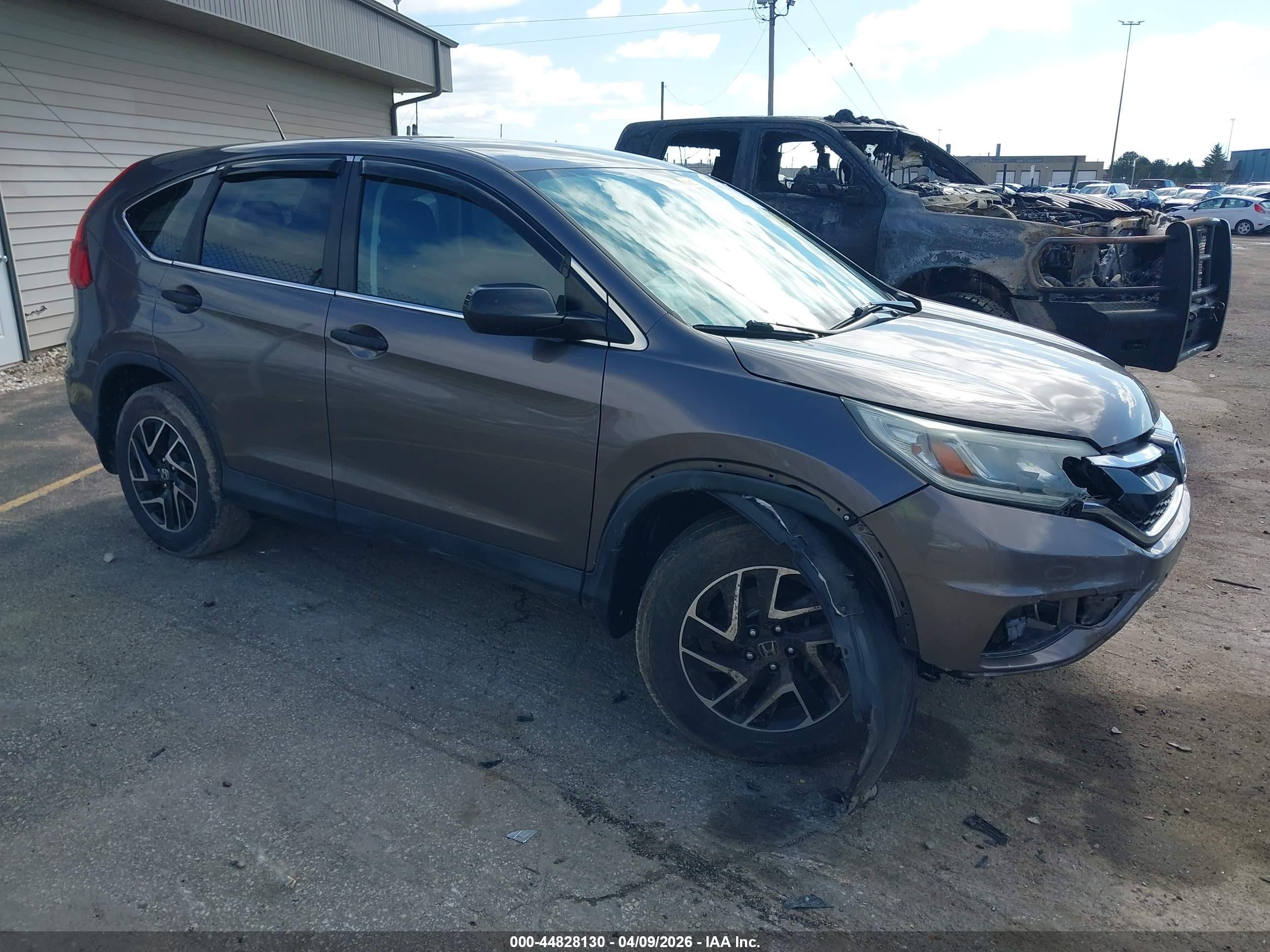 2016 Honda CR-V SE, VIN 2HKRM3H44GH520249 — Side