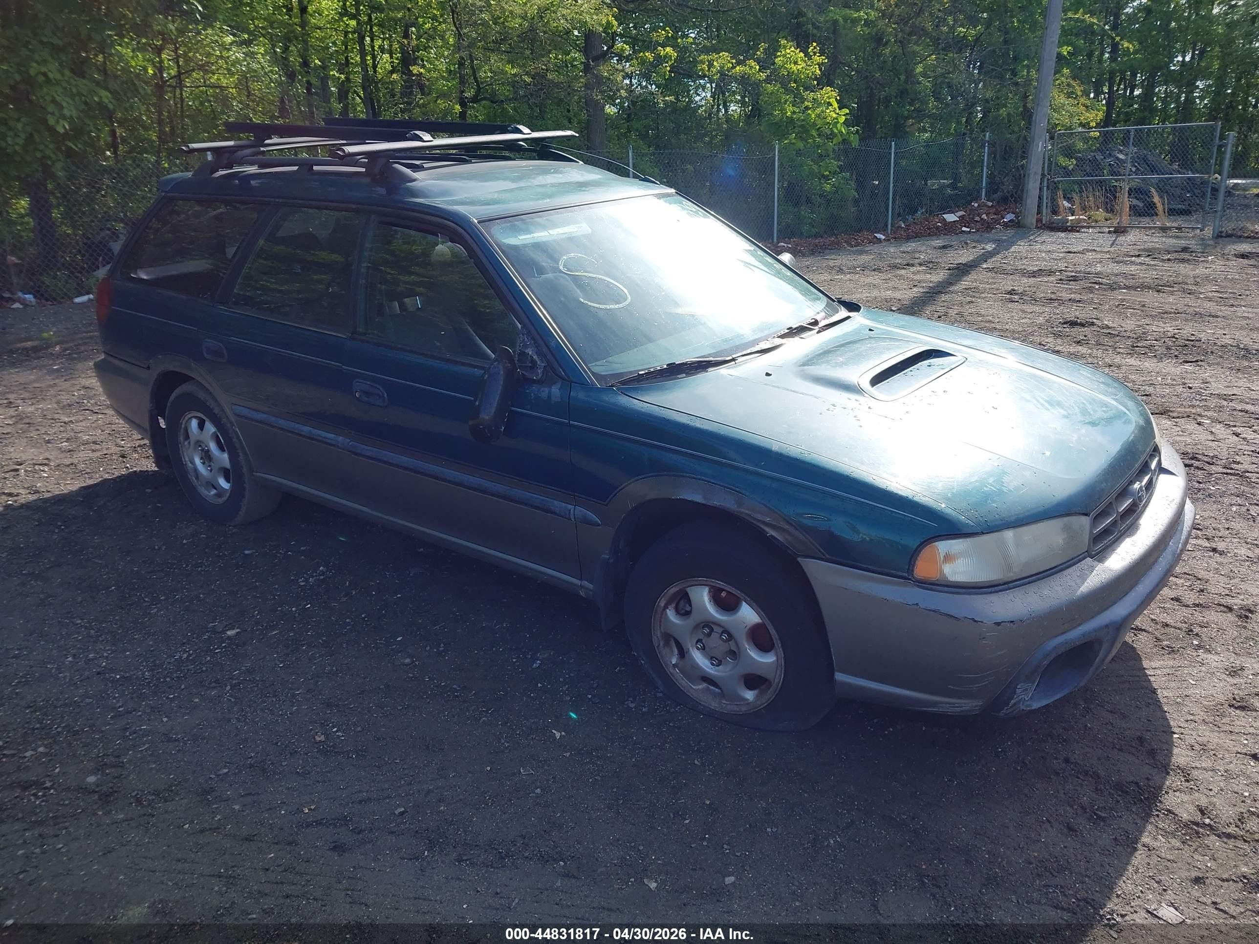1997 Subaru Legacy Outback, VIN 4S3BG6852V7616241 — Бок