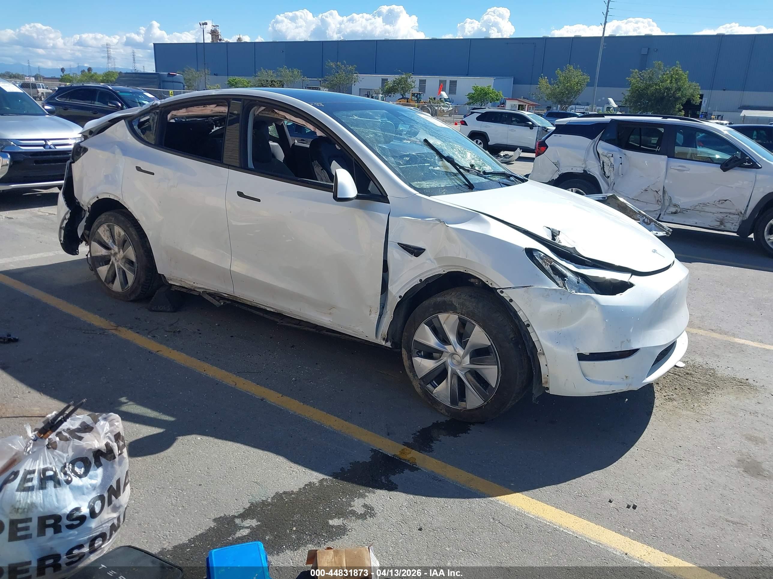 2023 Tesla Model Y Long Range, VIN 7SAYGDEE5PA080322 — Rollover
