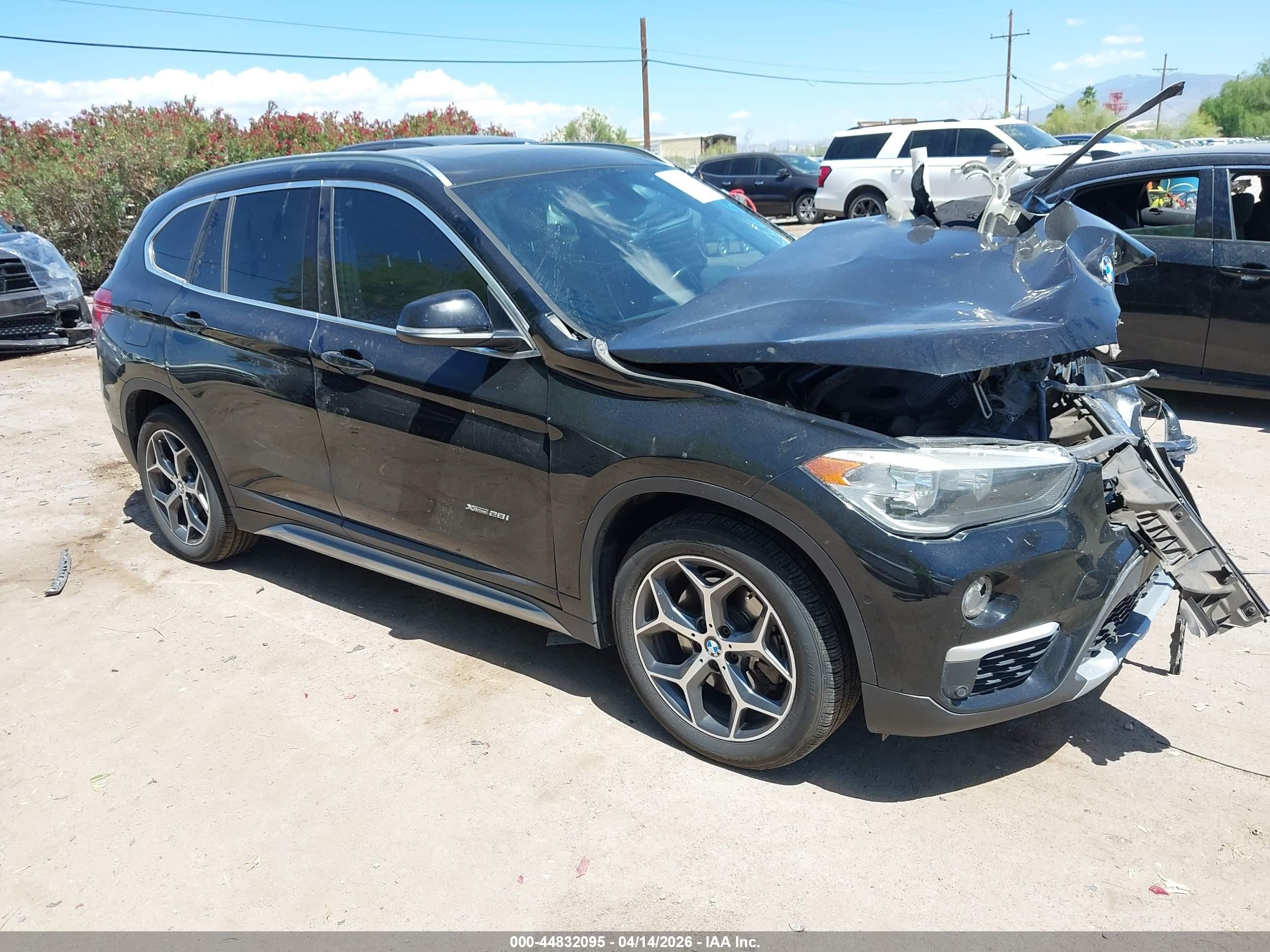 2018 BMW X1 xDrive28i, VIN WBXHT3Z38J4A66594 — Front end