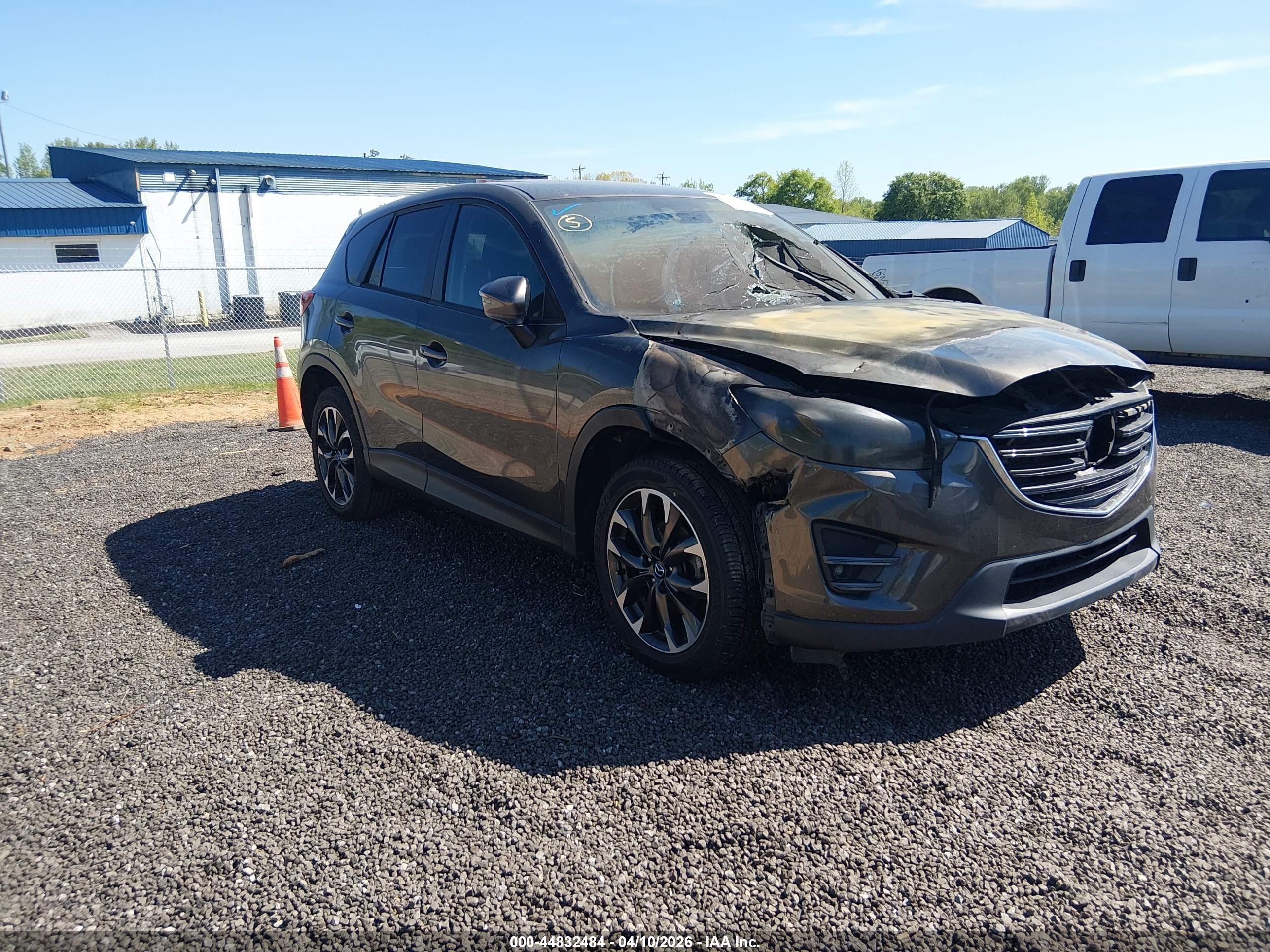 2016 Mazda CX-5 Grand Touring, VIN JM3KE4DY4G0774805 — Engine fire