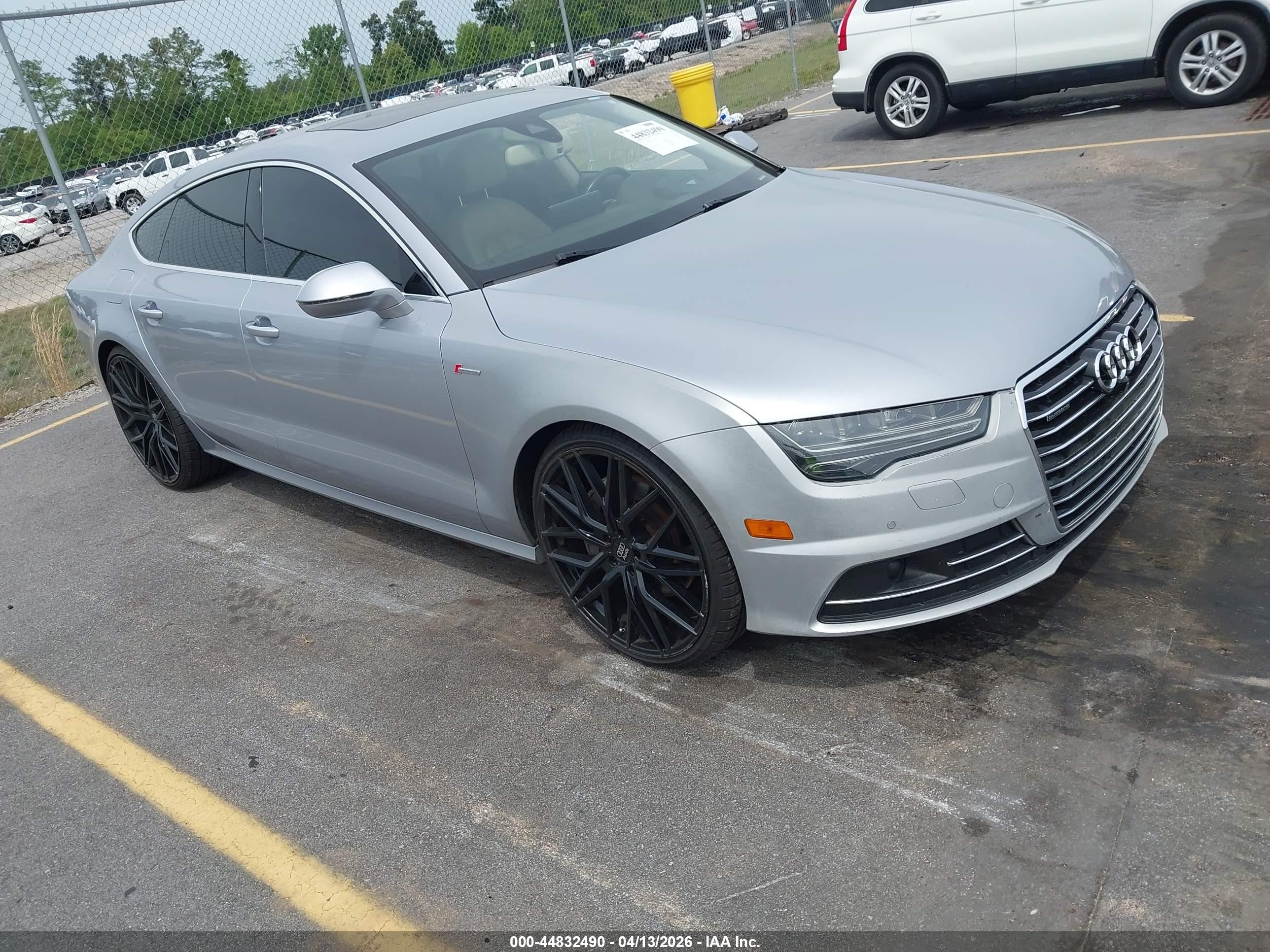 2016 Audi A7 Prestige, VIN WAU2GAFC0GN141608 — Repossession