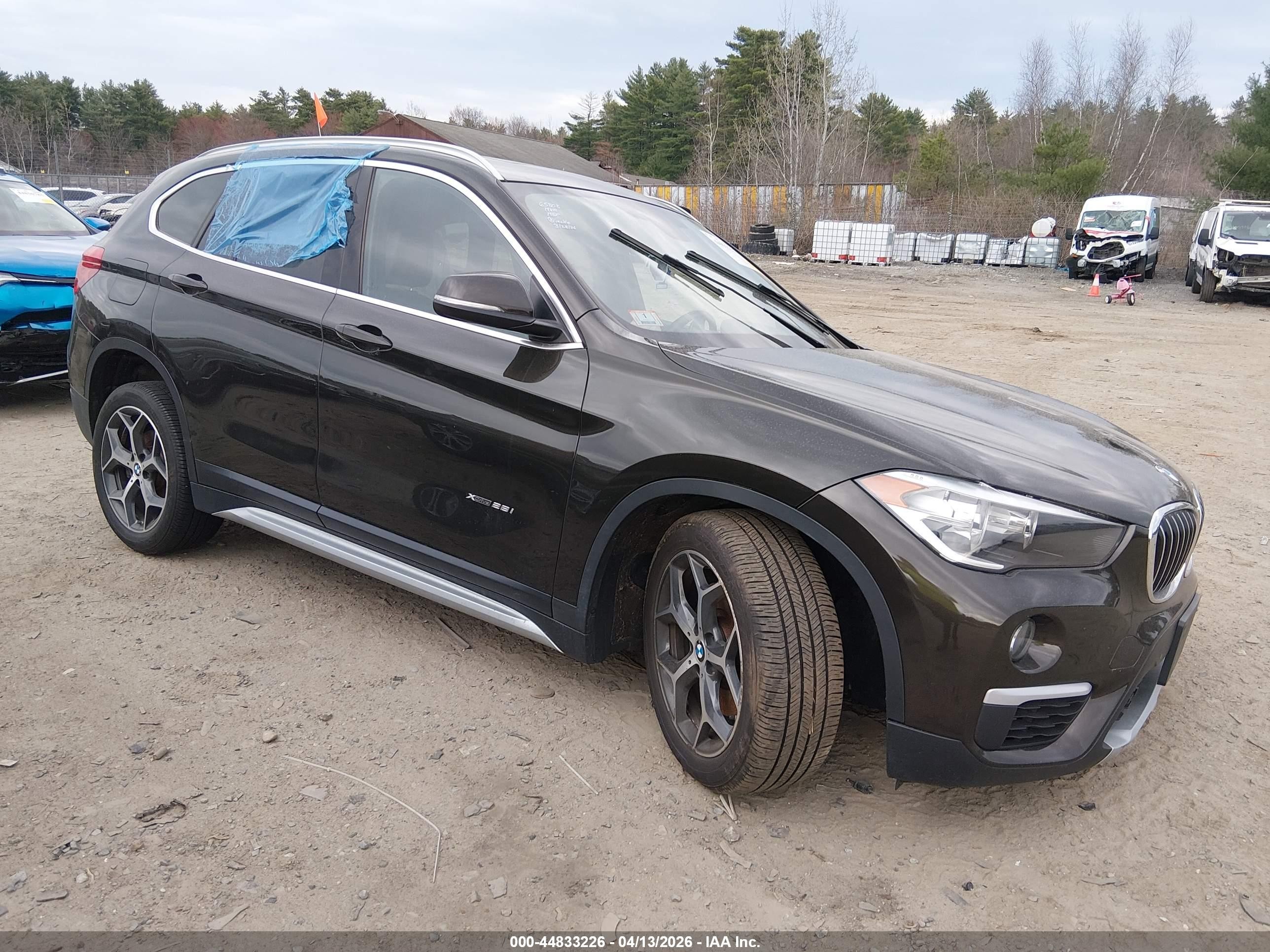 2018 BMW X1 xDrive28i, VIN WBXHT3C30J5F91099 — Front end