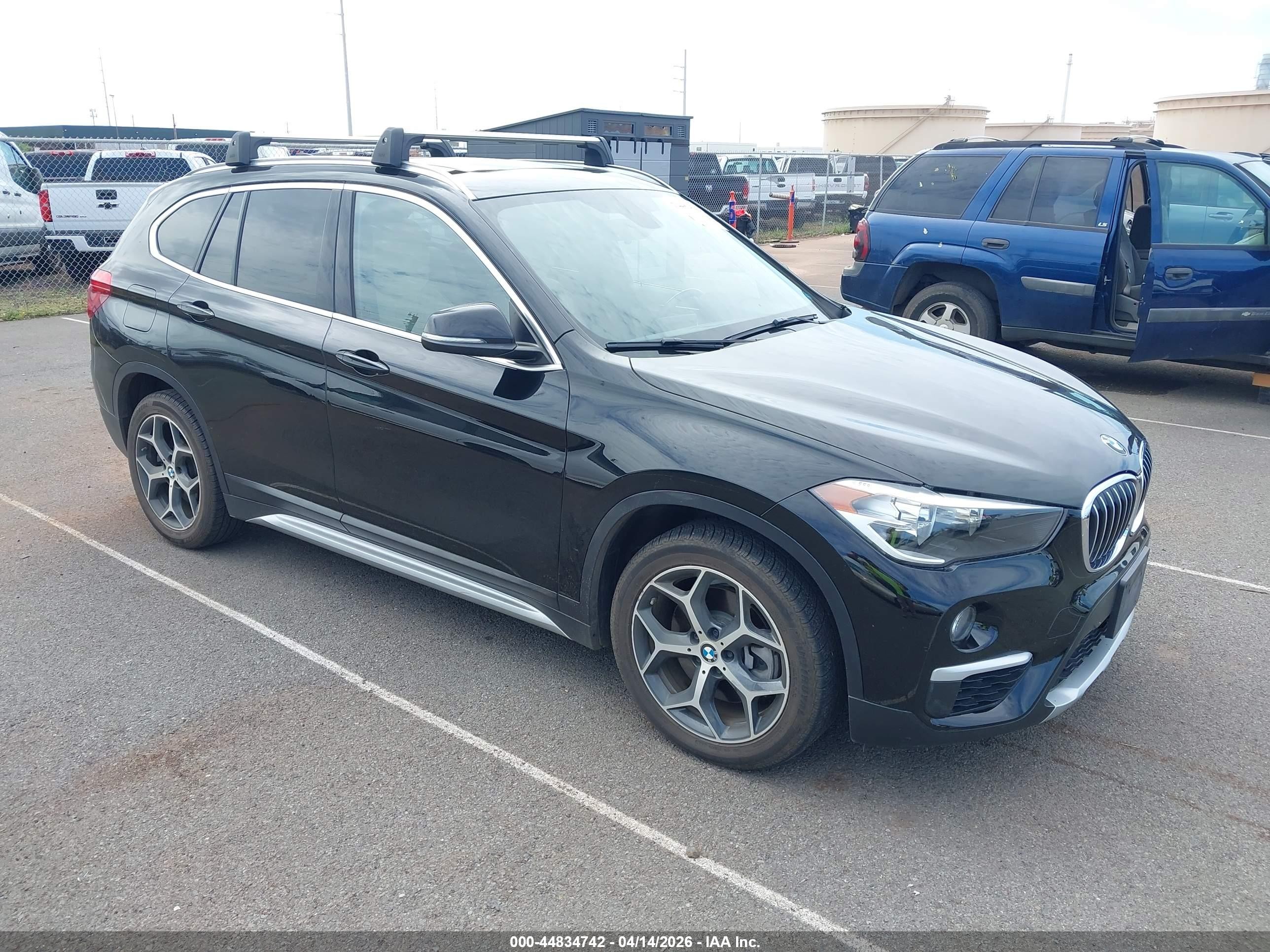 2018 BMW X1 sDrive28i, VIN WBXHU7C32J5L06047 — Water / flood