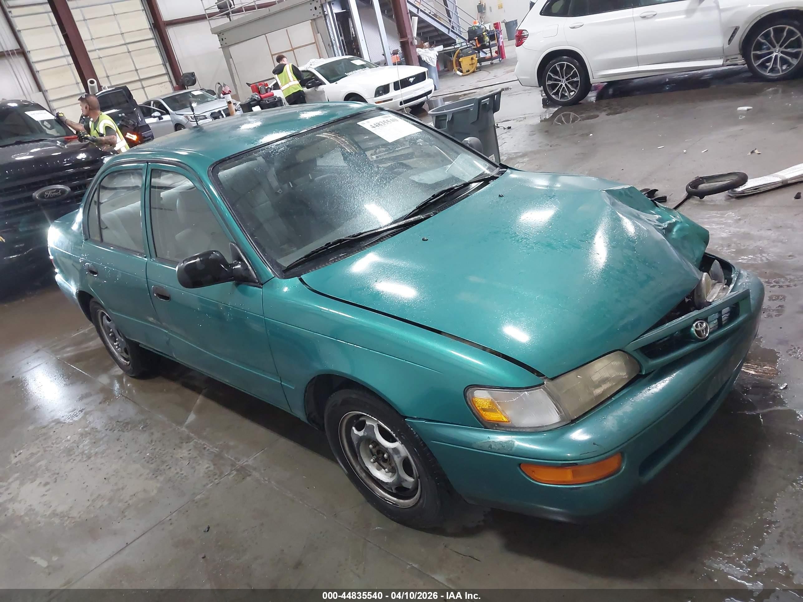 1997 Toyota Corolla, VIN 1NXBA02E4VZ511723 — Front end