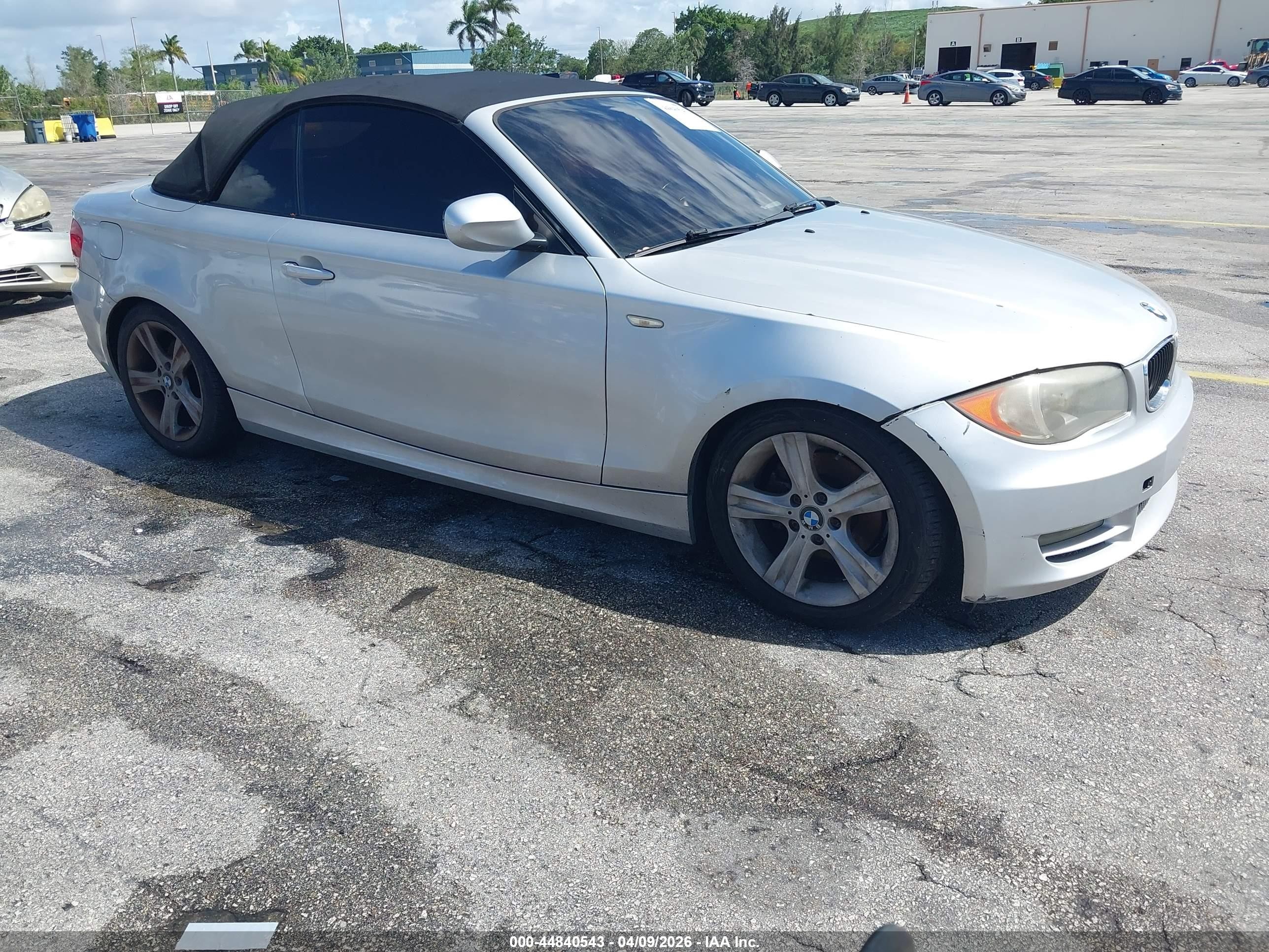 2011 BMW 1 Series 128i, VIN WBAUL7C50BVM78947 — Auction photo