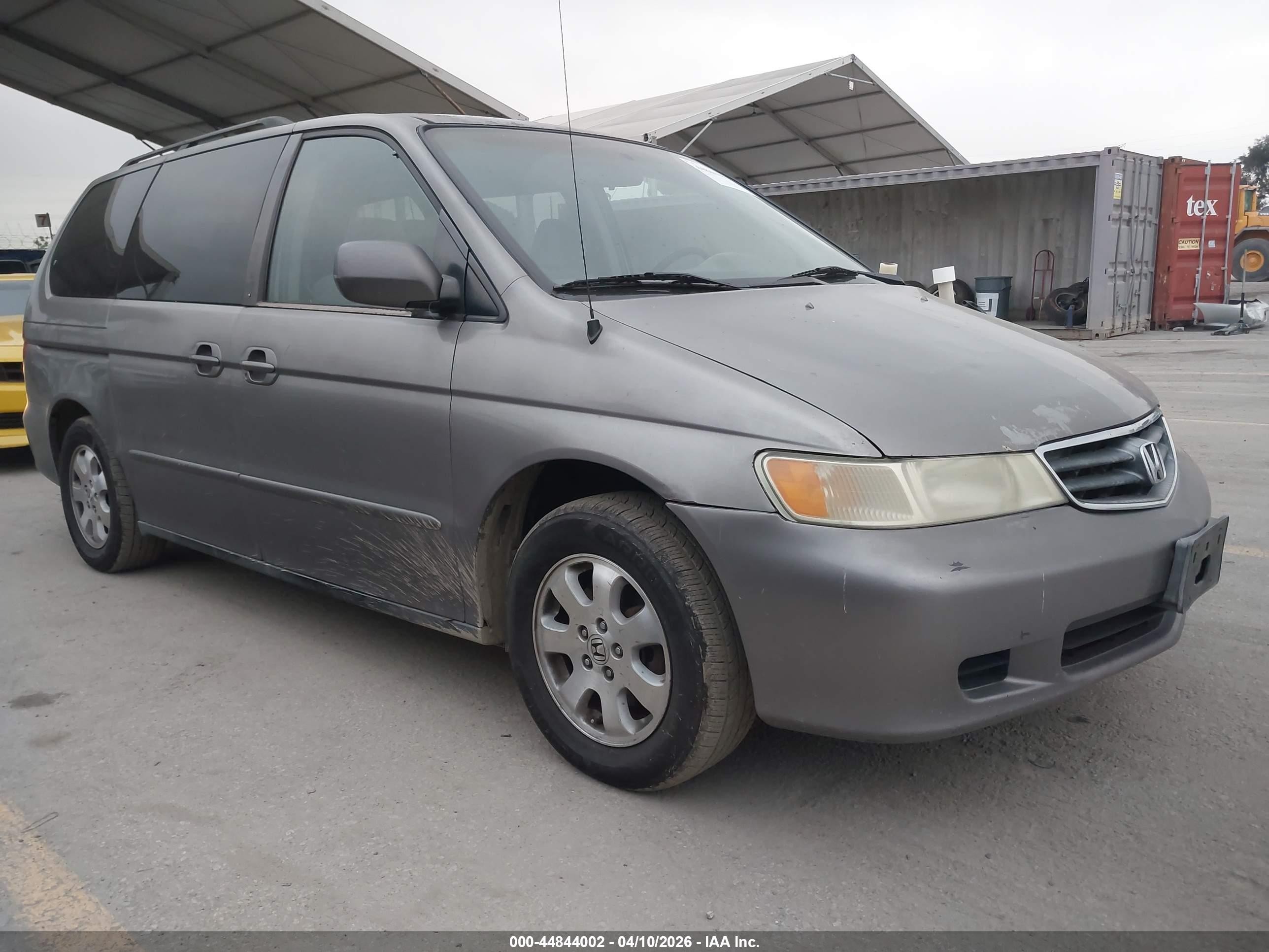 1999 Honda Odyssey EX, VIN 2HKRL1862XH503829 — Side