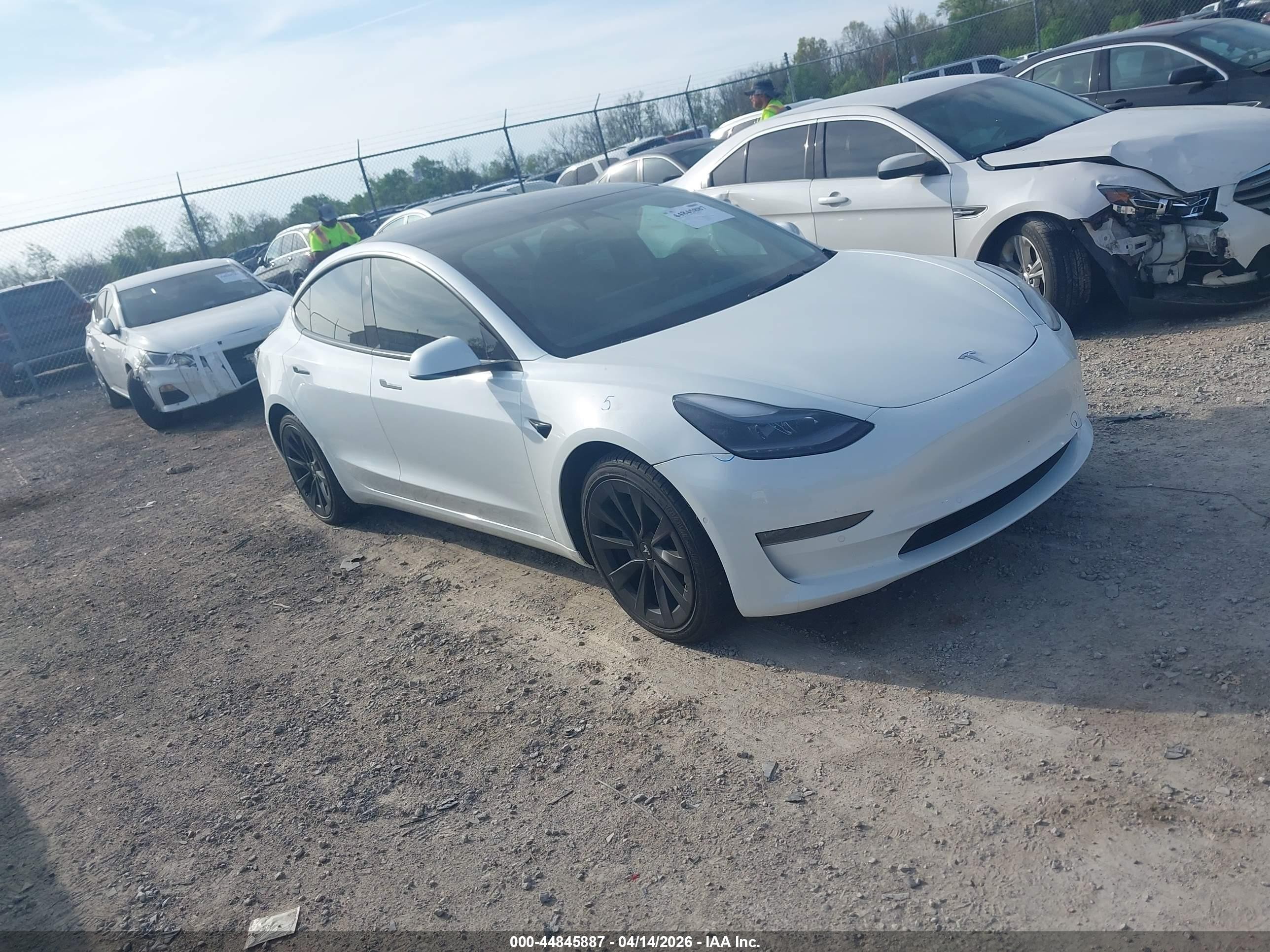 2022 Tesla Model 3 Long Range, VIN 5YJ3E1EB2NF124567 — Not stated