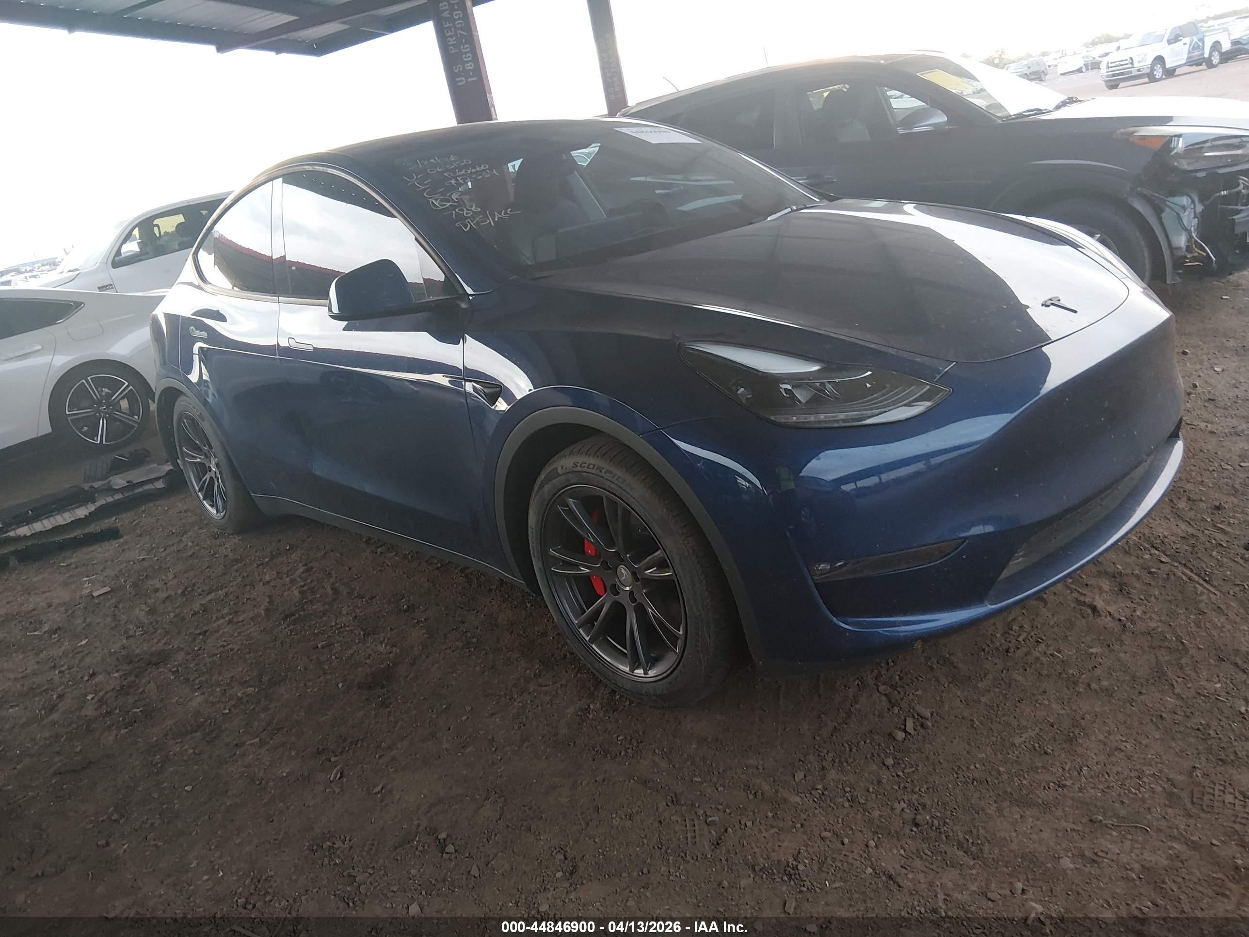 2024 Tesla Model Y Performance, VIN 7SAYGDEF7RF063150 — Side