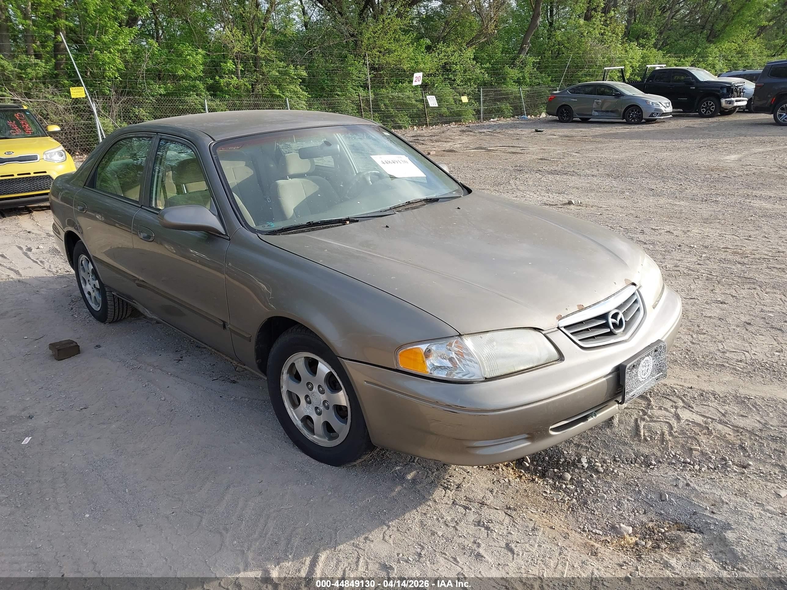 2002 Mazda 626 LX, VIN 1YVGF22C125301215 — Side
