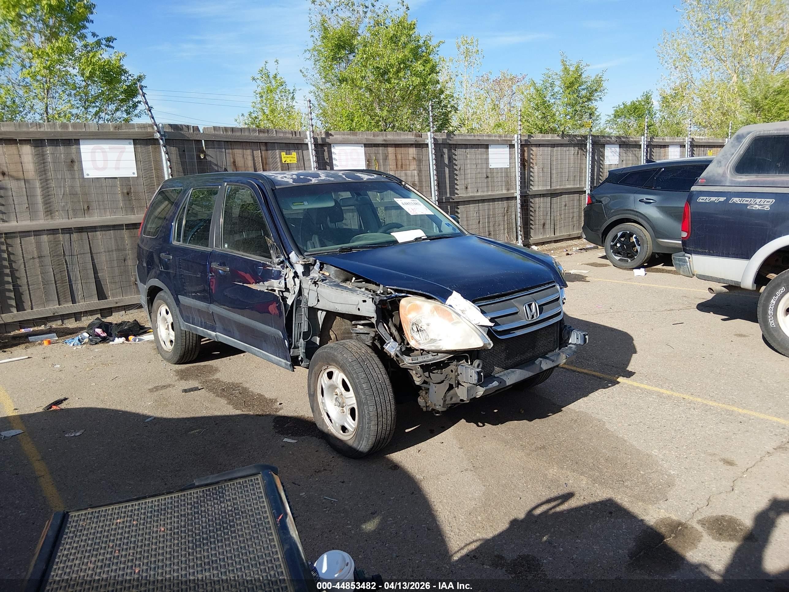 2005 Honda CR-V LX, VIN JHLRD685X5C002605 — Side