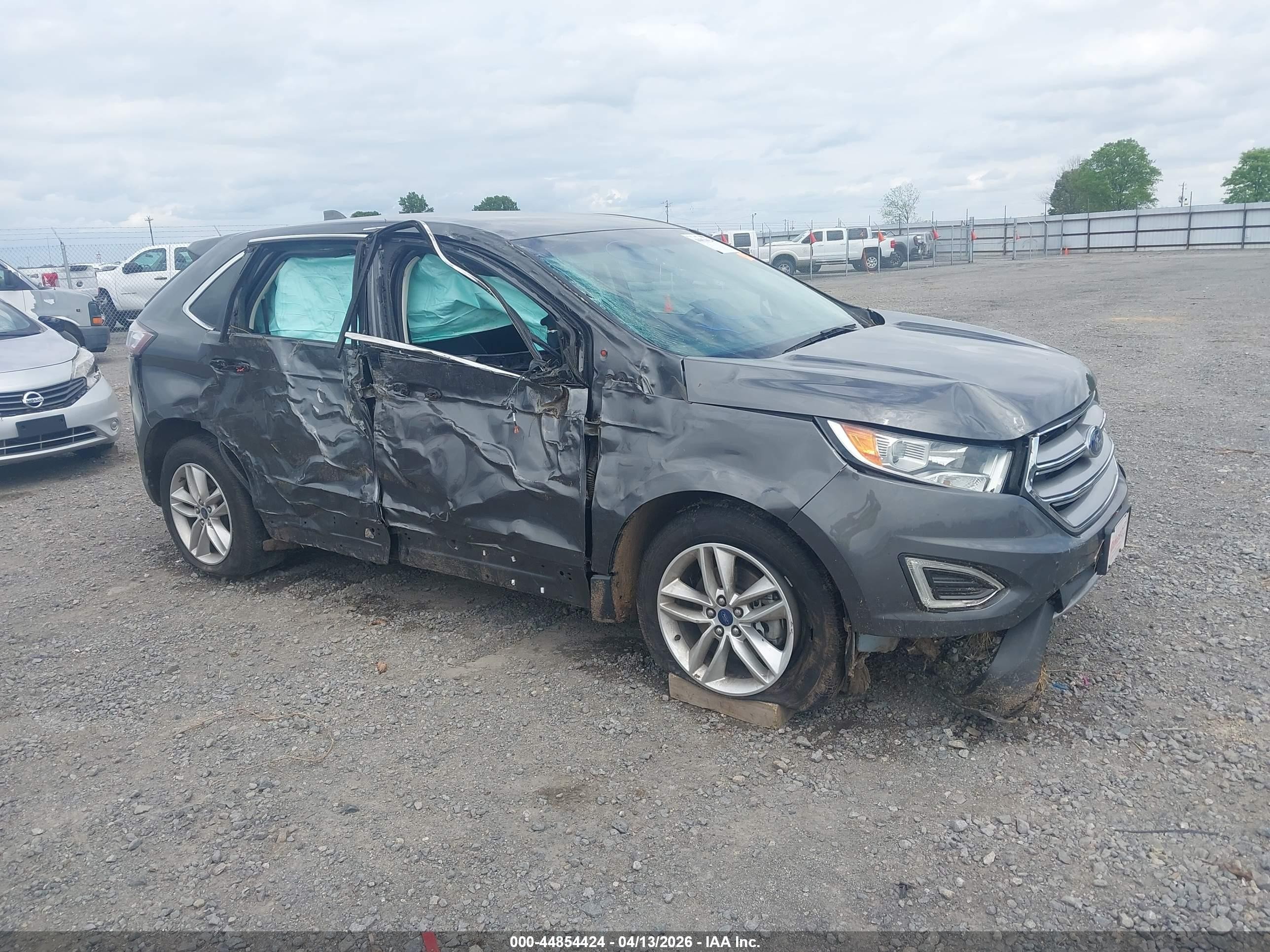 2017 Ford Edge SEL, VIN 2FMPK3J9XHBC03104 — Side