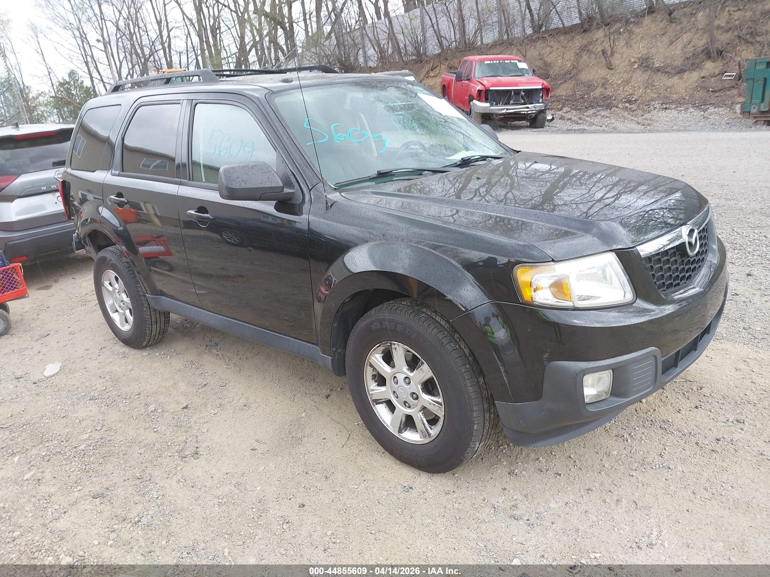 2011 Mazda Tribute Touring, VIN 4F2CY9C79BKM06580 — Зад