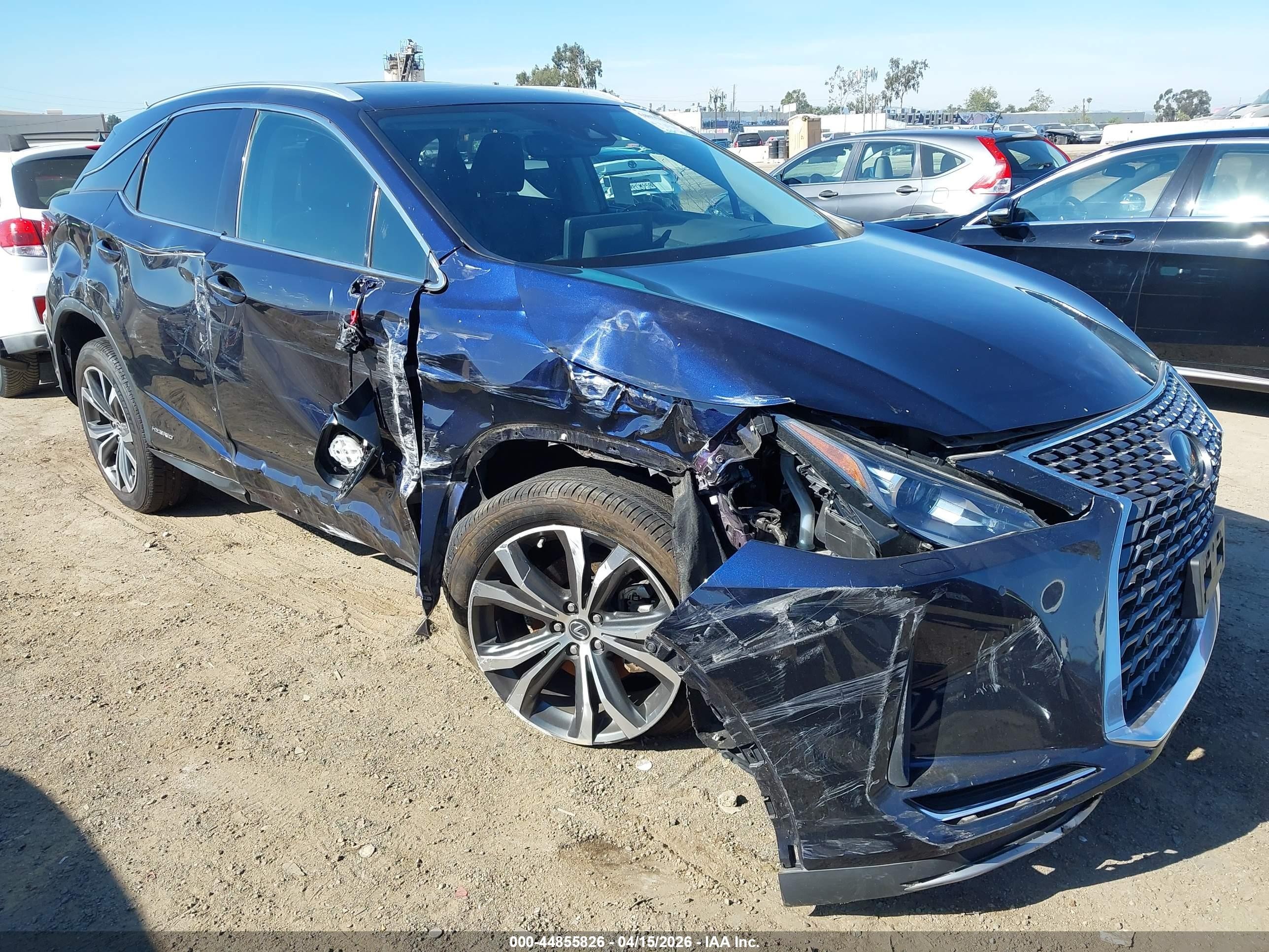 2020 Lexus RX 450h, VIN 2T2HGMDA9LC051852 — Бок