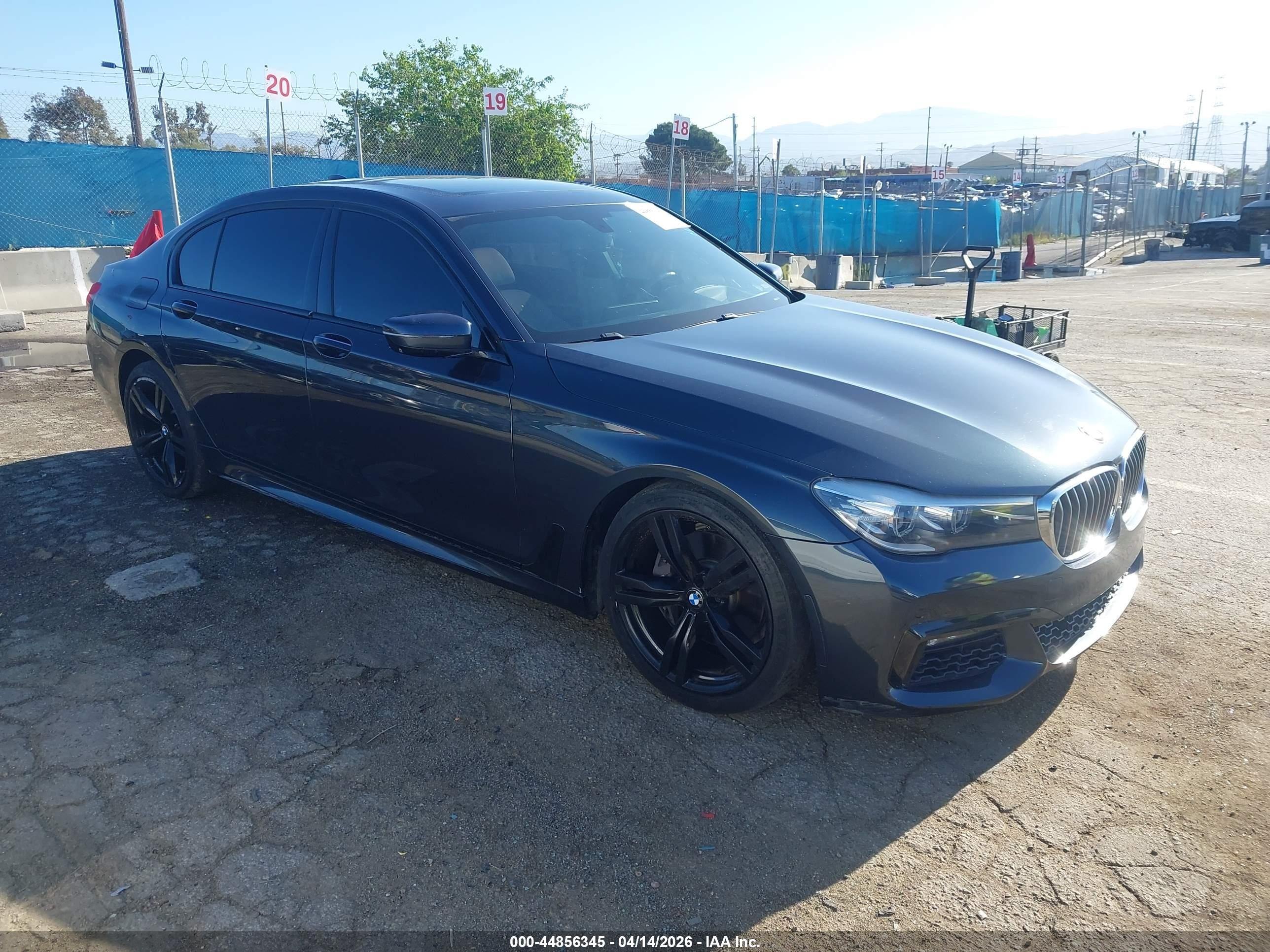 2016 BMW 7 Series 740i, VIN WBA7E2C58GG739053 — Rear end