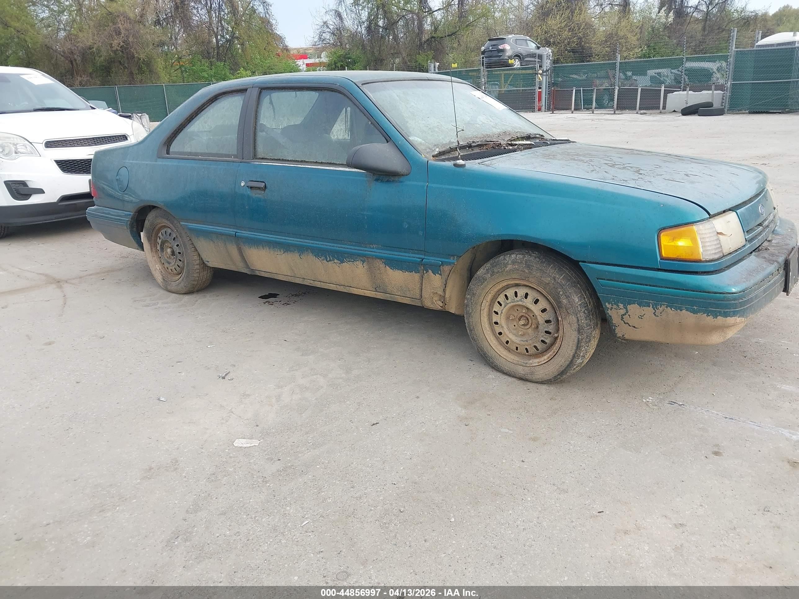 1993 Ford Tempo, VIN 1FAPP31X7PK135486 — Normal wear