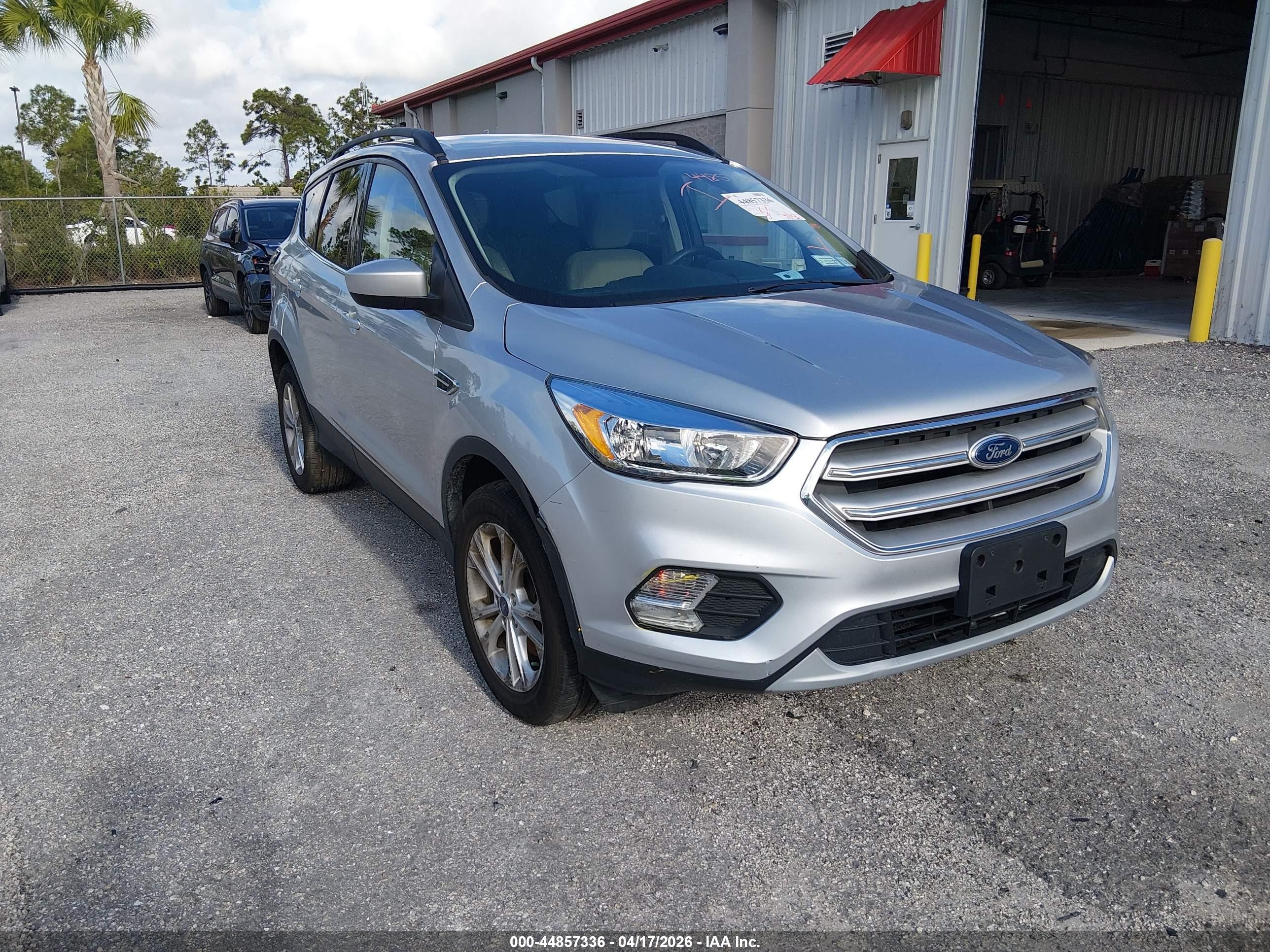 2018 Ford Escape SE, VIN 1FMCU9GD0JUD06409 — Side