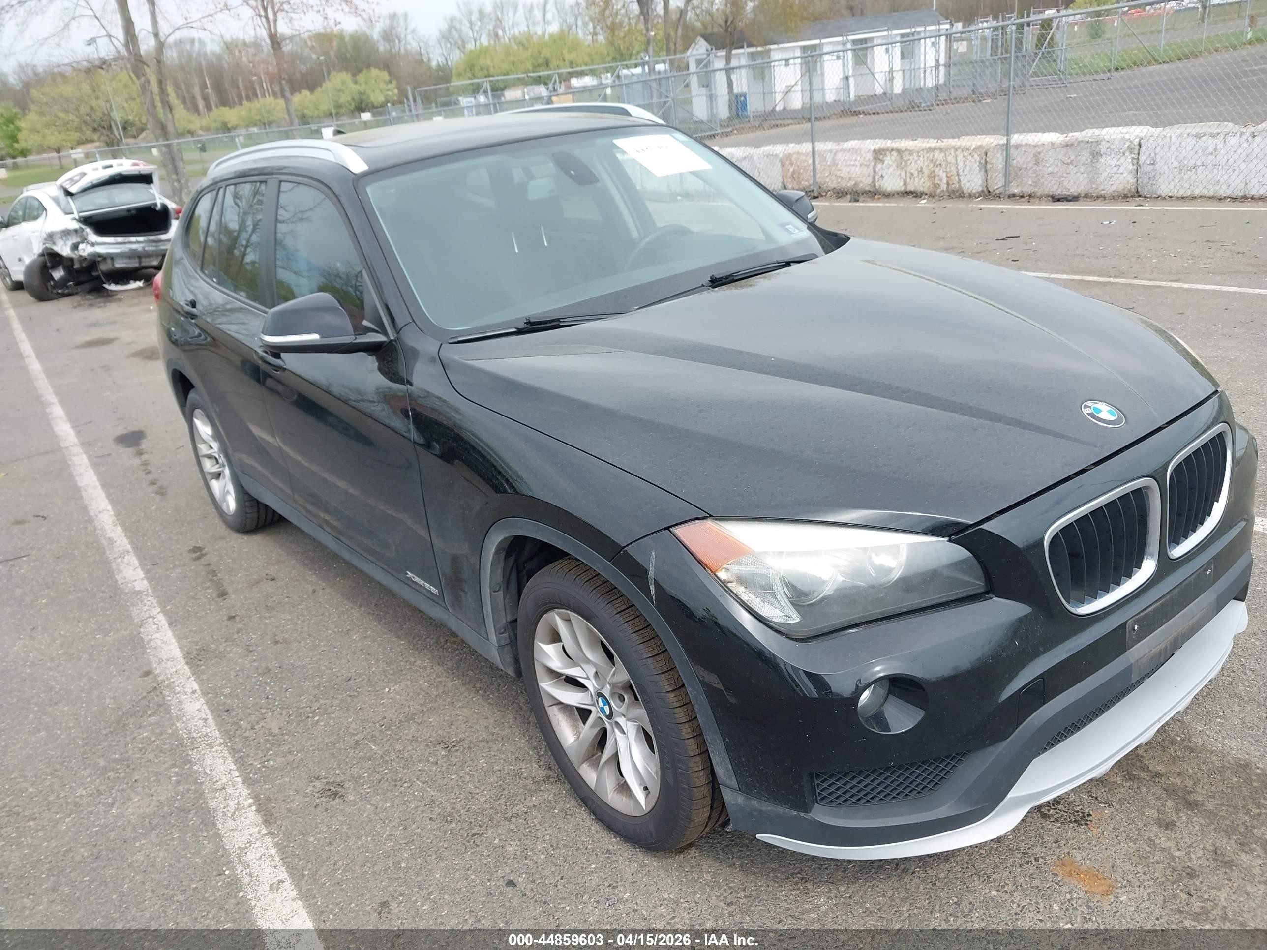 2015 BMW X1 xDrive28i, VIN WBAVL1C52FVY34449 — Rear end