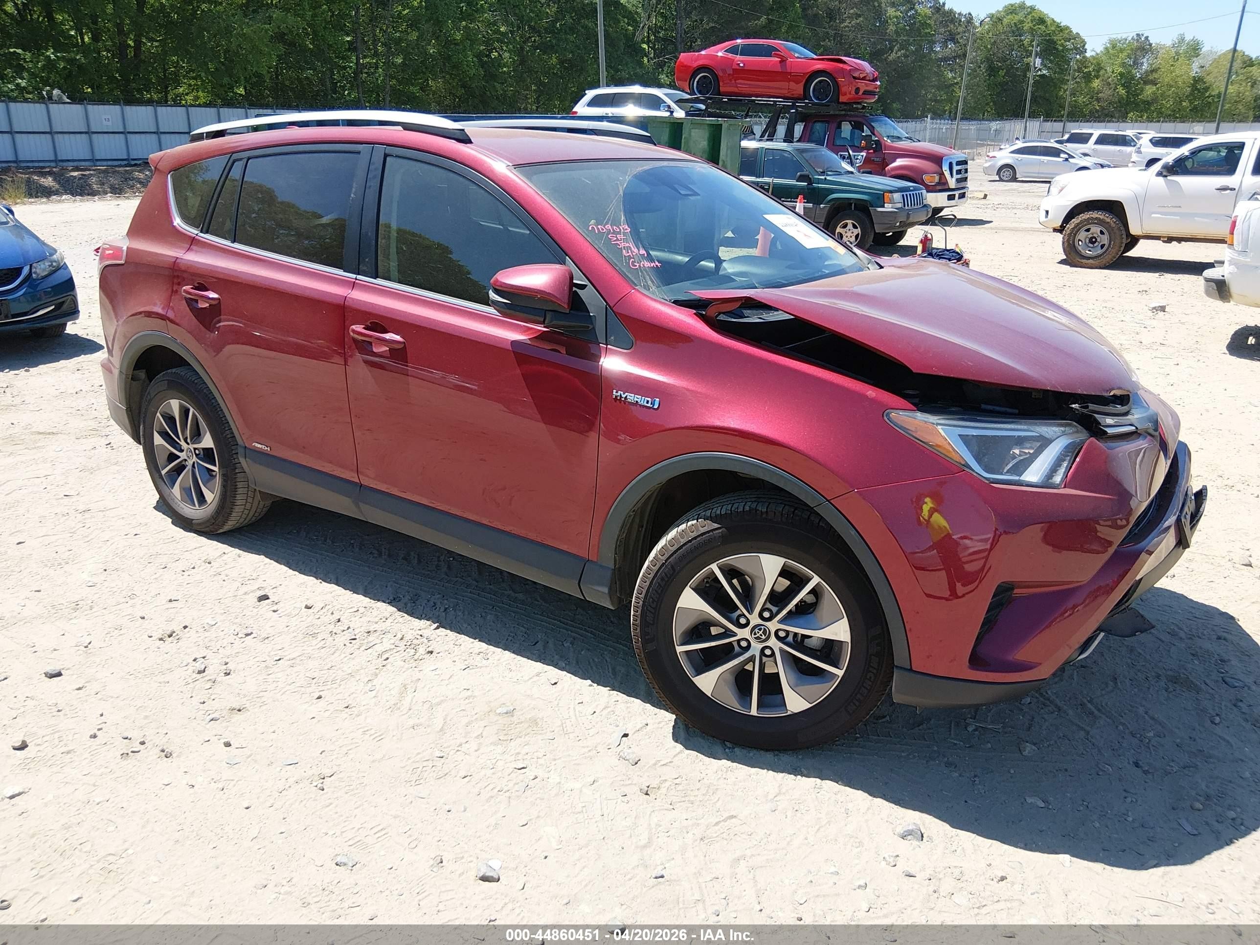 2018 Toyota RAV4 Hybrid XLE, VIN JTMRJREV9JD254572 — Front end