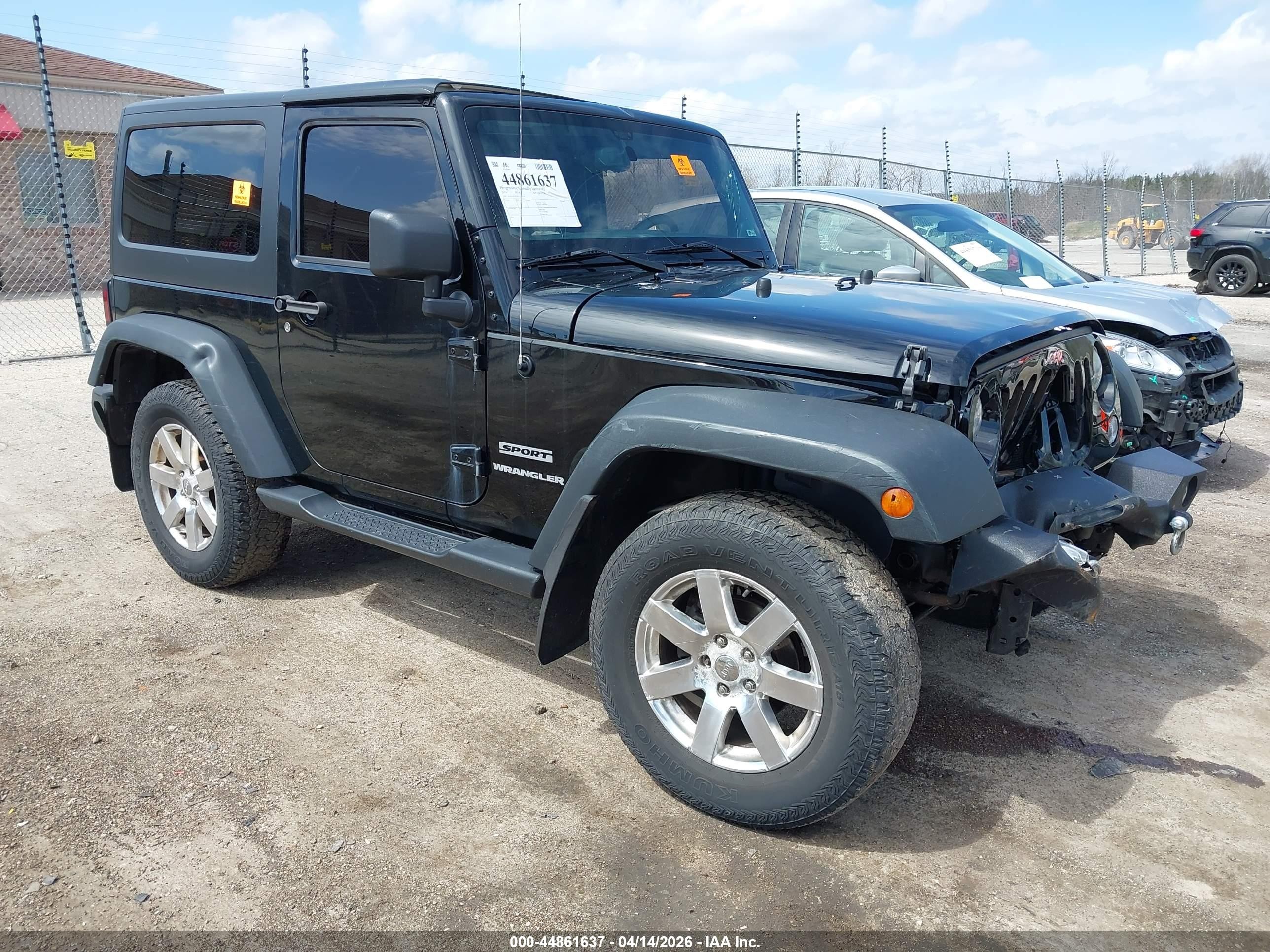 2014 Jeep Wrangler Sport, VIN 1C4AJWAGXEL227024 — Storm