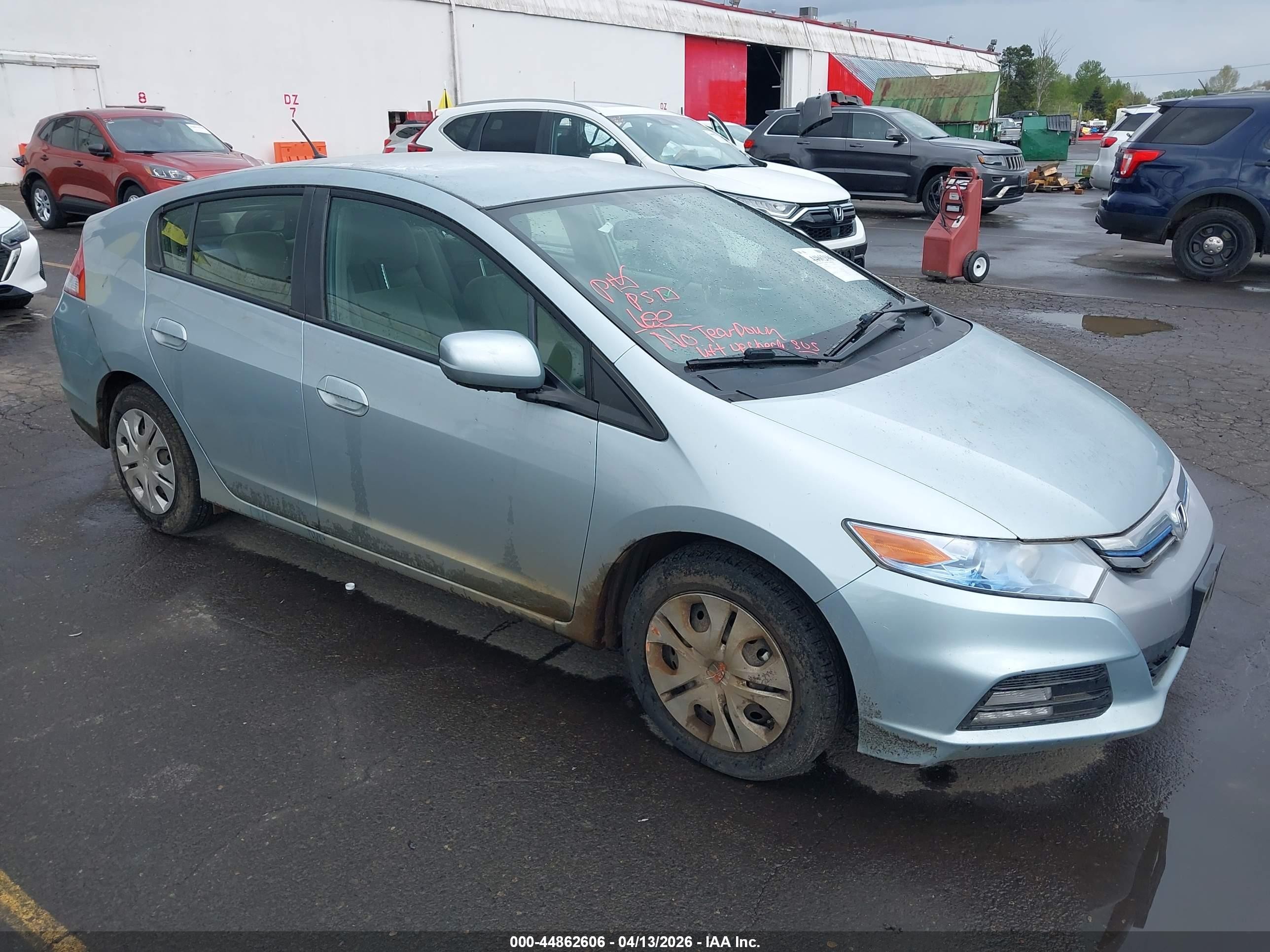 2013 Honda Insight LX, VIN JHMZE2H54DS003173 — Side