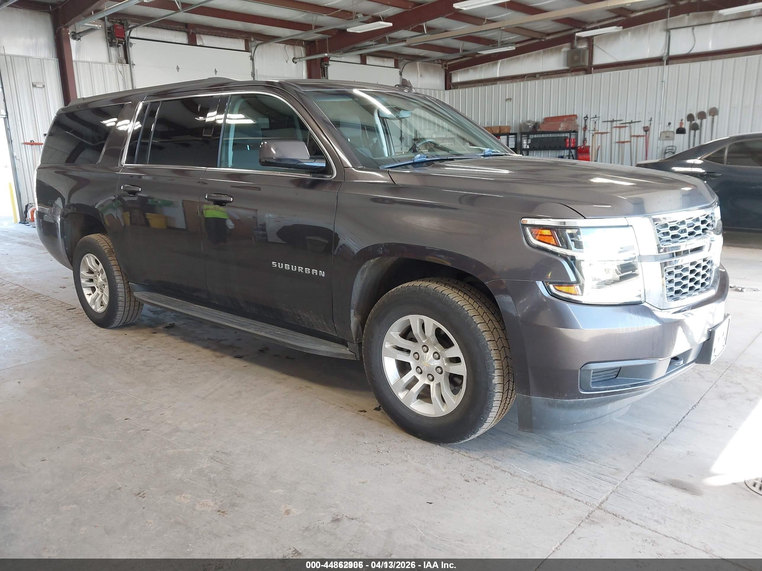 2018 Chevrolet Suburban Commercial, VIN 1GNSKKEC0JR181963 — Side