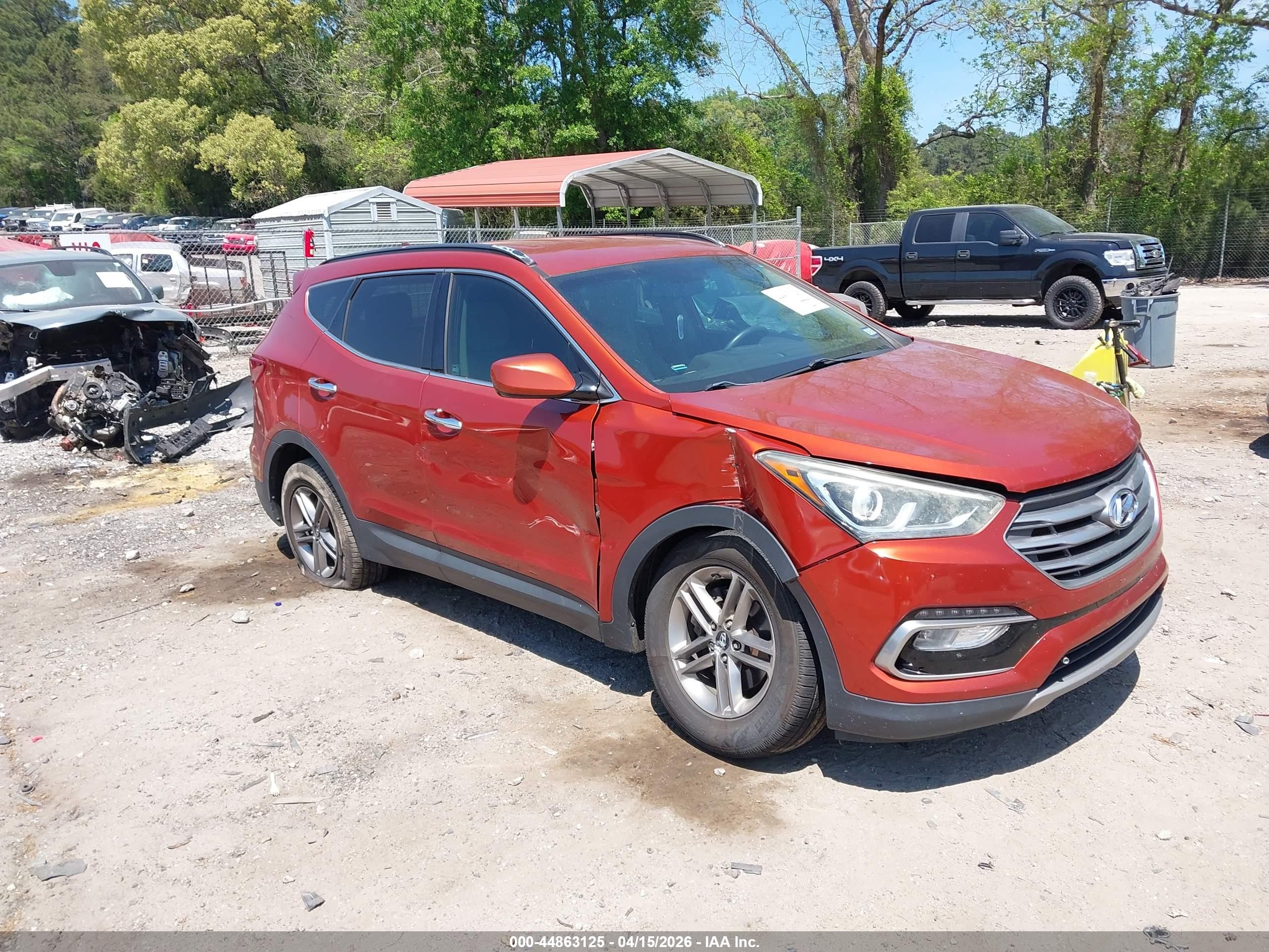 2017 Hyundai Santa Fe 2.4L, VIN 5XYZU3LB9HG418282 — Side
