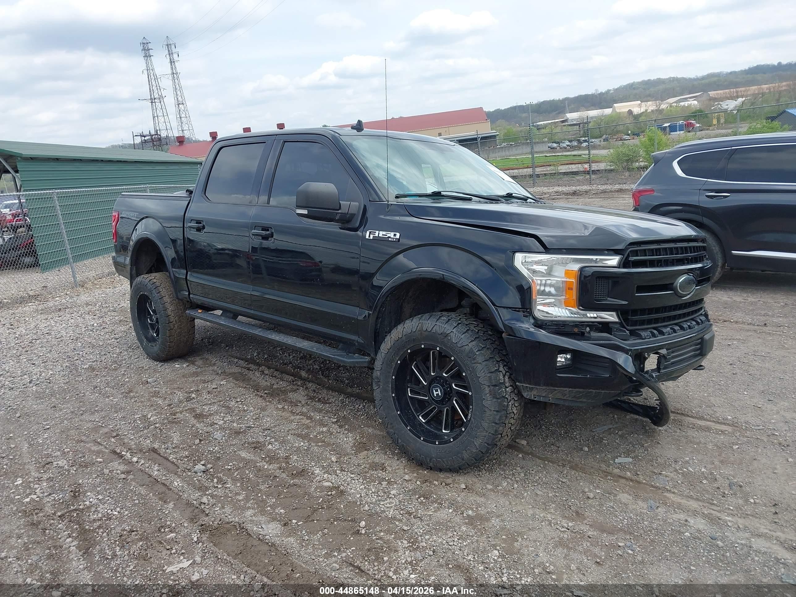 2018 Ford F-150 Lariat, VIN 1FTEW1E53JFA75756 — Side