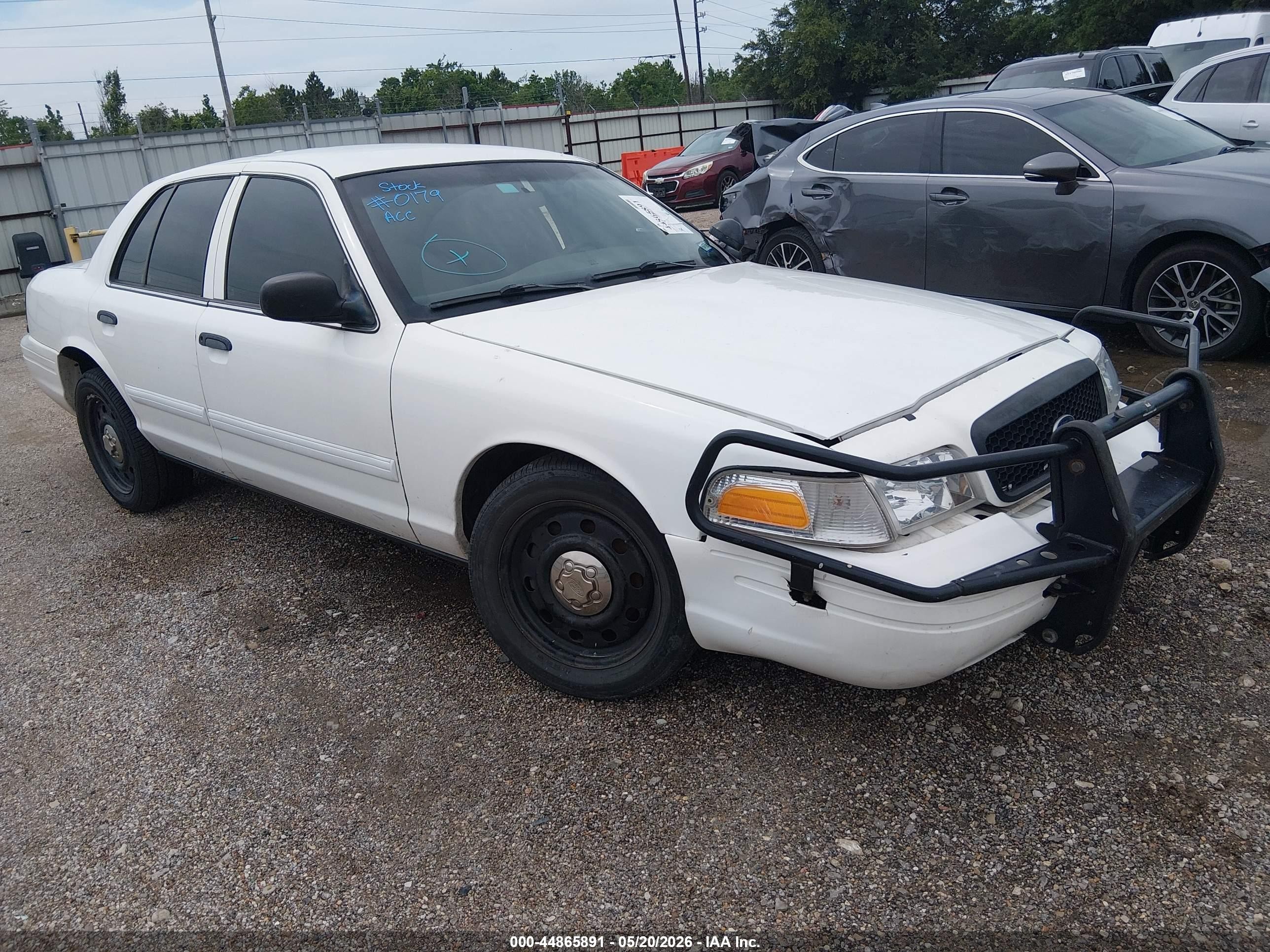 2010 Ford Police Interceptor, VIN 2FABP7BV8AX119249 — Side