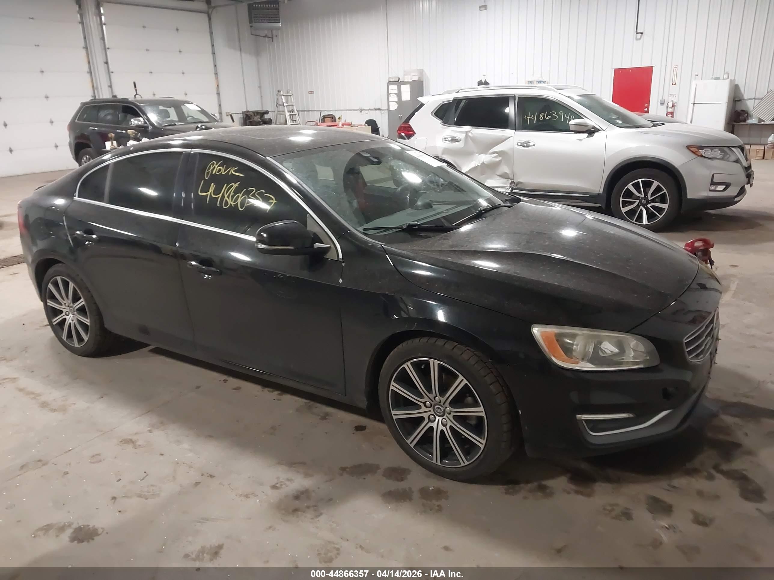 2016 Volvo S60 T5 Drive-E Premier, VIN LYV402FK0GB095968 — Side