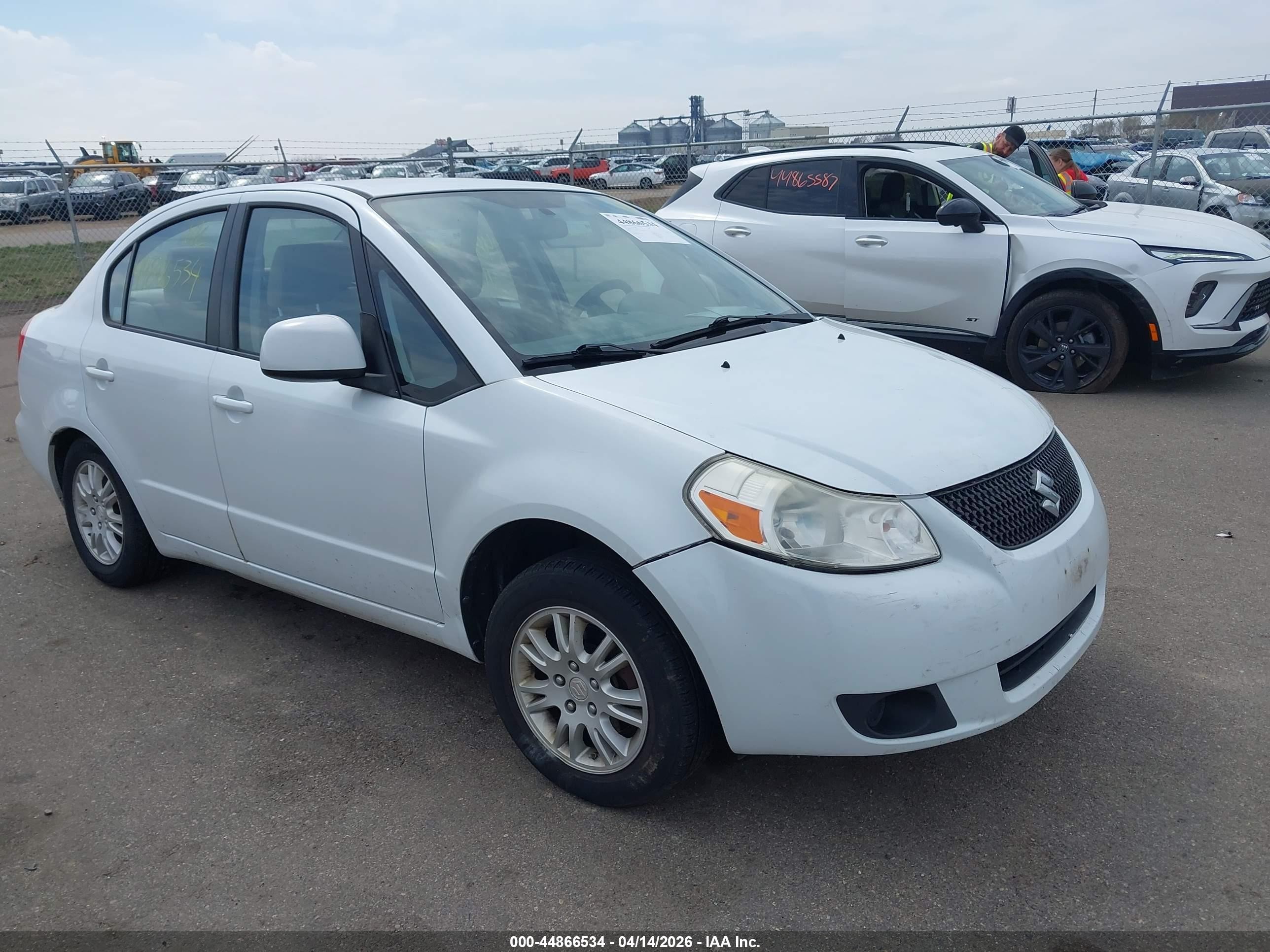 2012 Suzuki SX4 LE, VIN JS2YC5A31C6305790 — Rear end