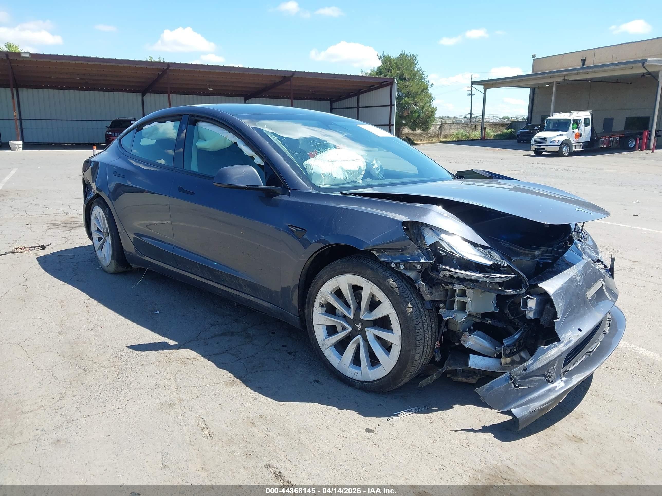 2022 Tesla Model 3, VIN 5YJ3E1EAXNF359306 — Front end