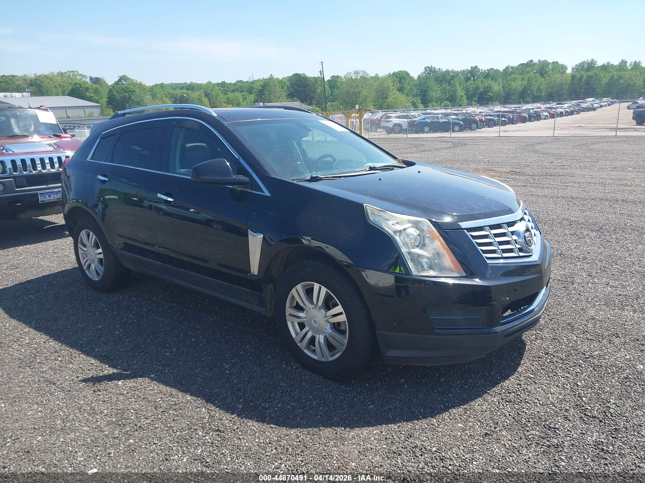 2016 Cadillac SRX Luxury Collection, VIN 3GYFNBE36GS532828 — Normal wear