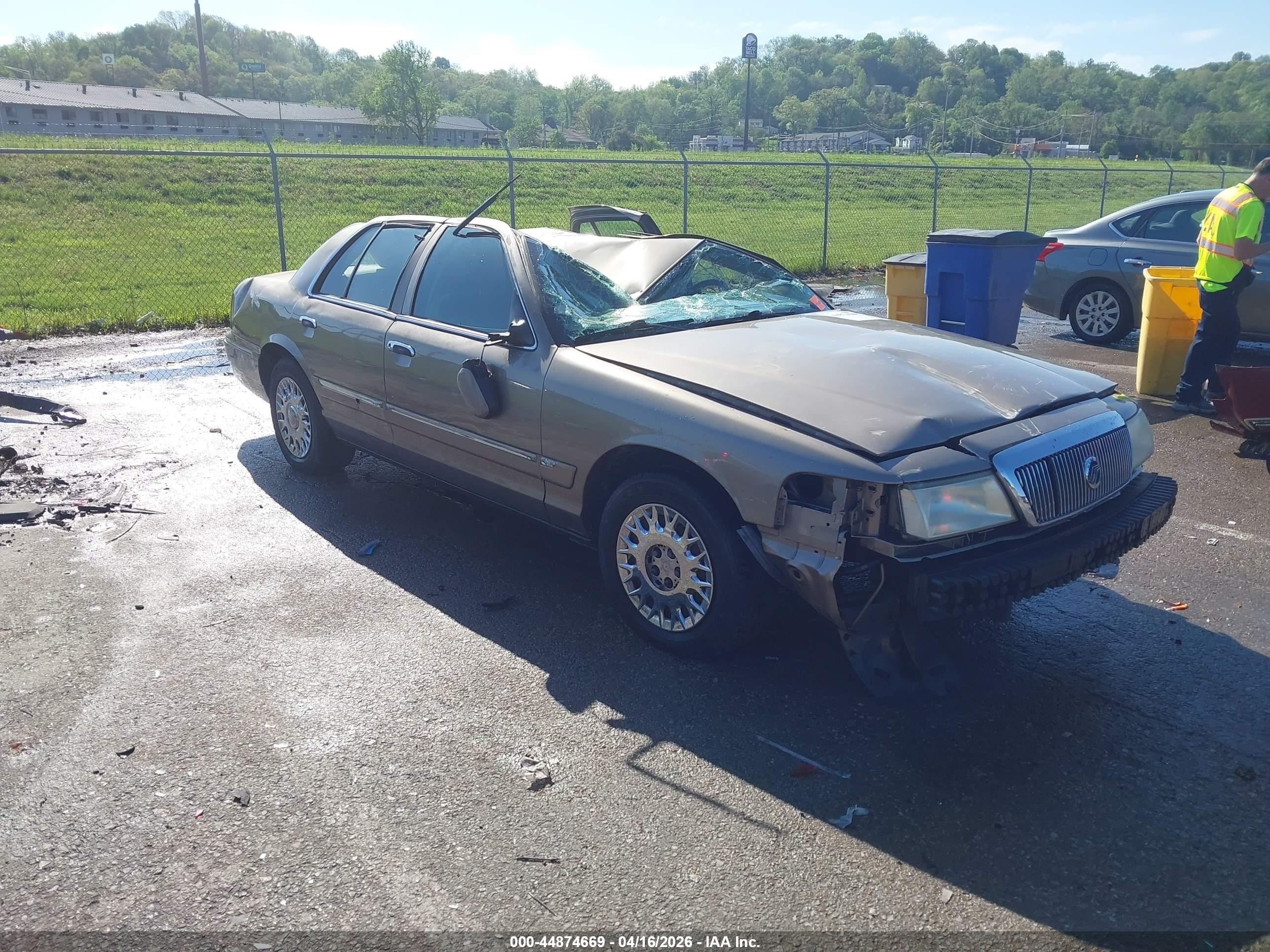 2004 Mercury Grand Marquis GS, VIN 2MEFM74W74X621277 — Rollover
