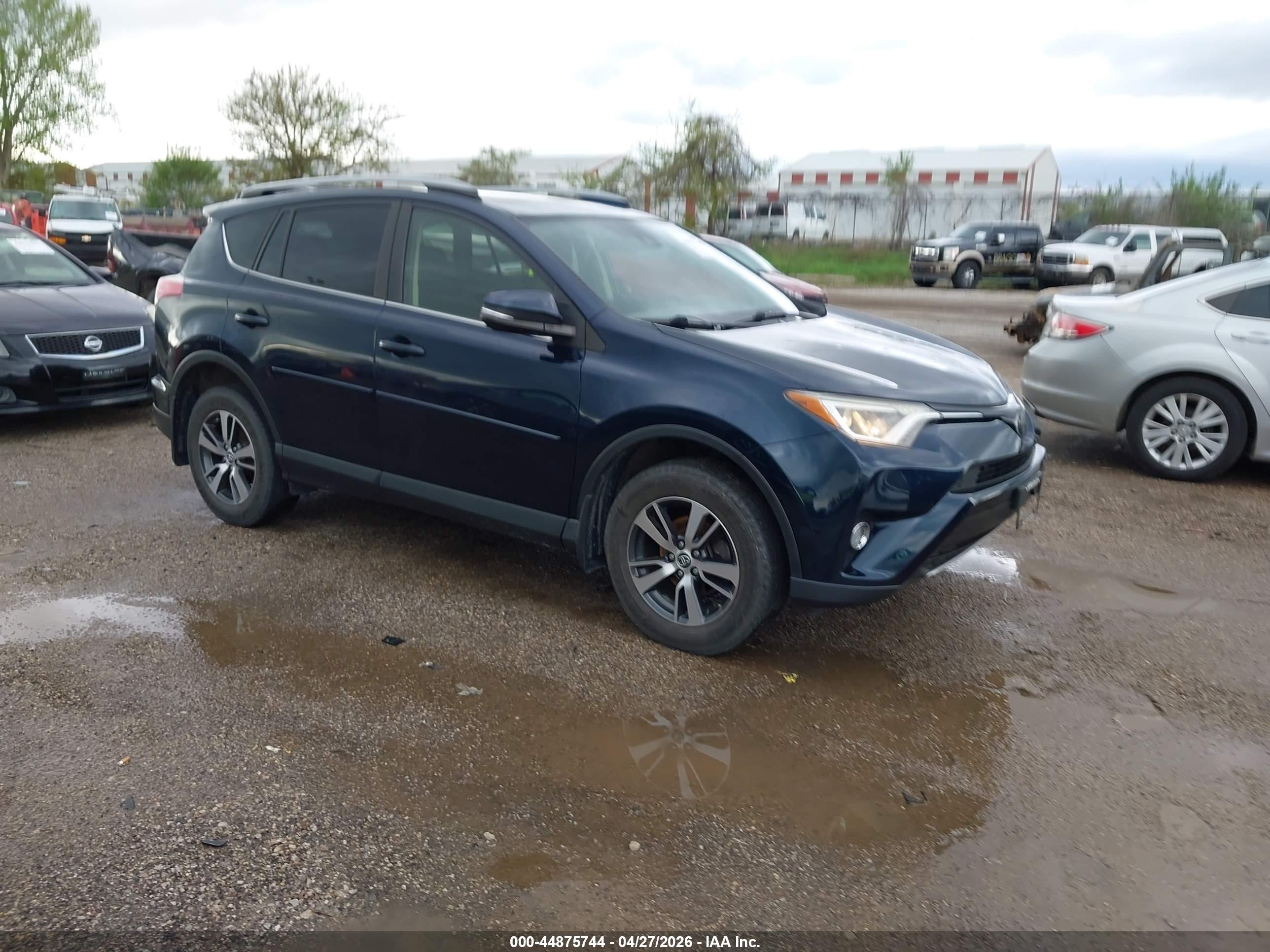 2017 Toyota RAV4 XLE, VIN JTMRFREV8HJ172121 — Hail