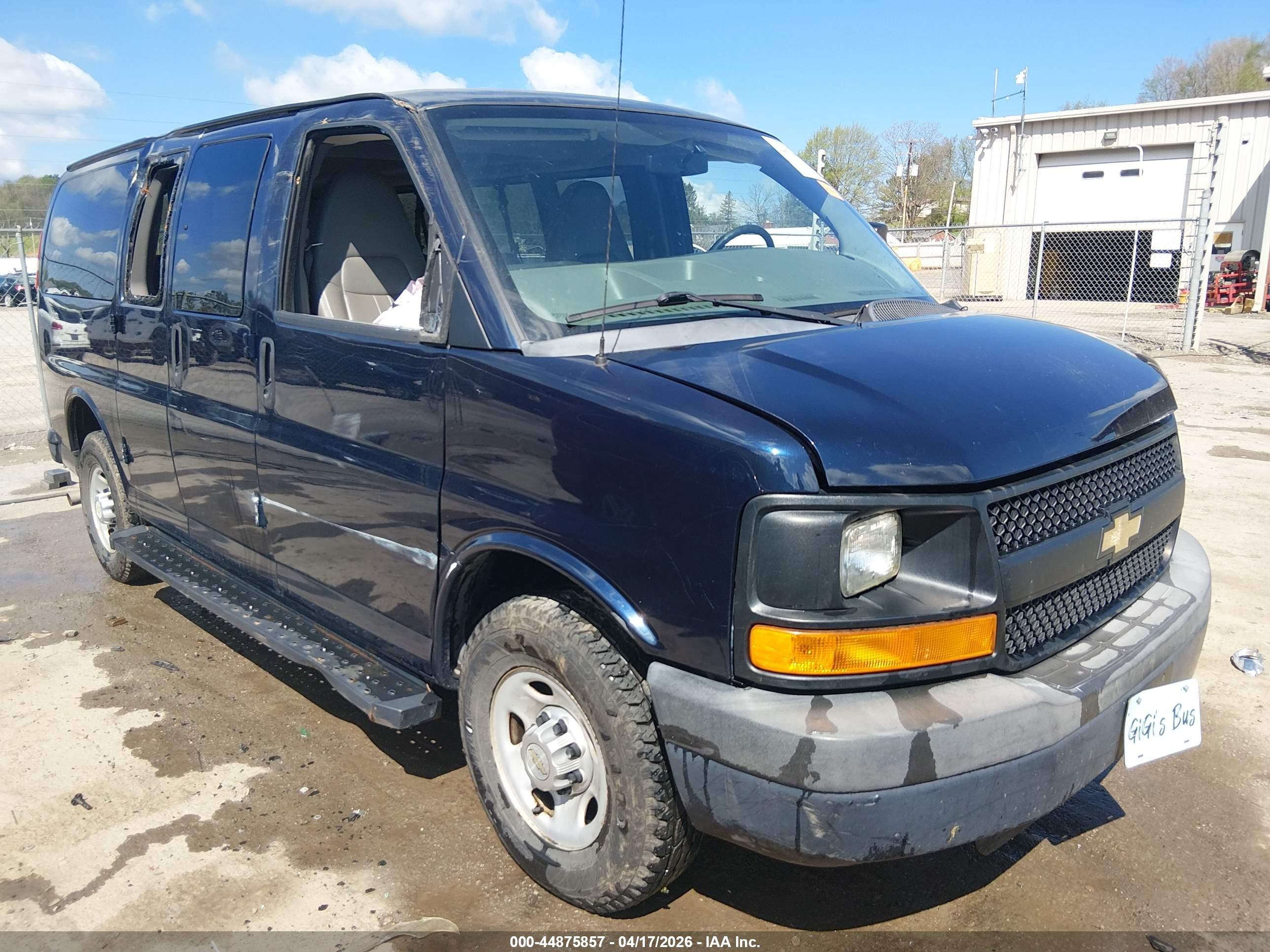 2012 Chevrolet Express Passenger 1LS, VIN 1GAWGPFA3C1195713 — Side