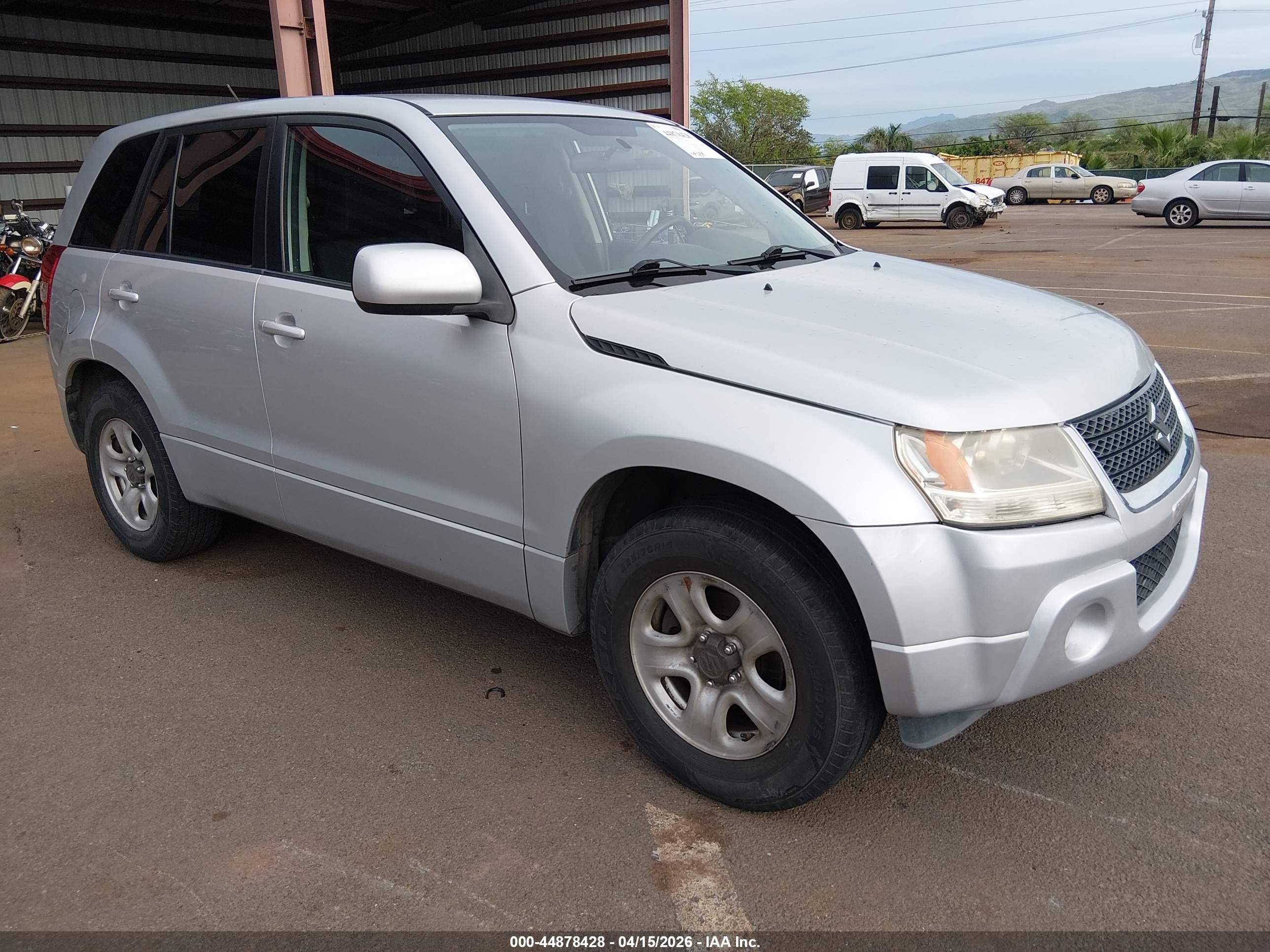 2012 Suzuki Grand Vitara Premium, VIN JS3TE0D20C4100303 — Side