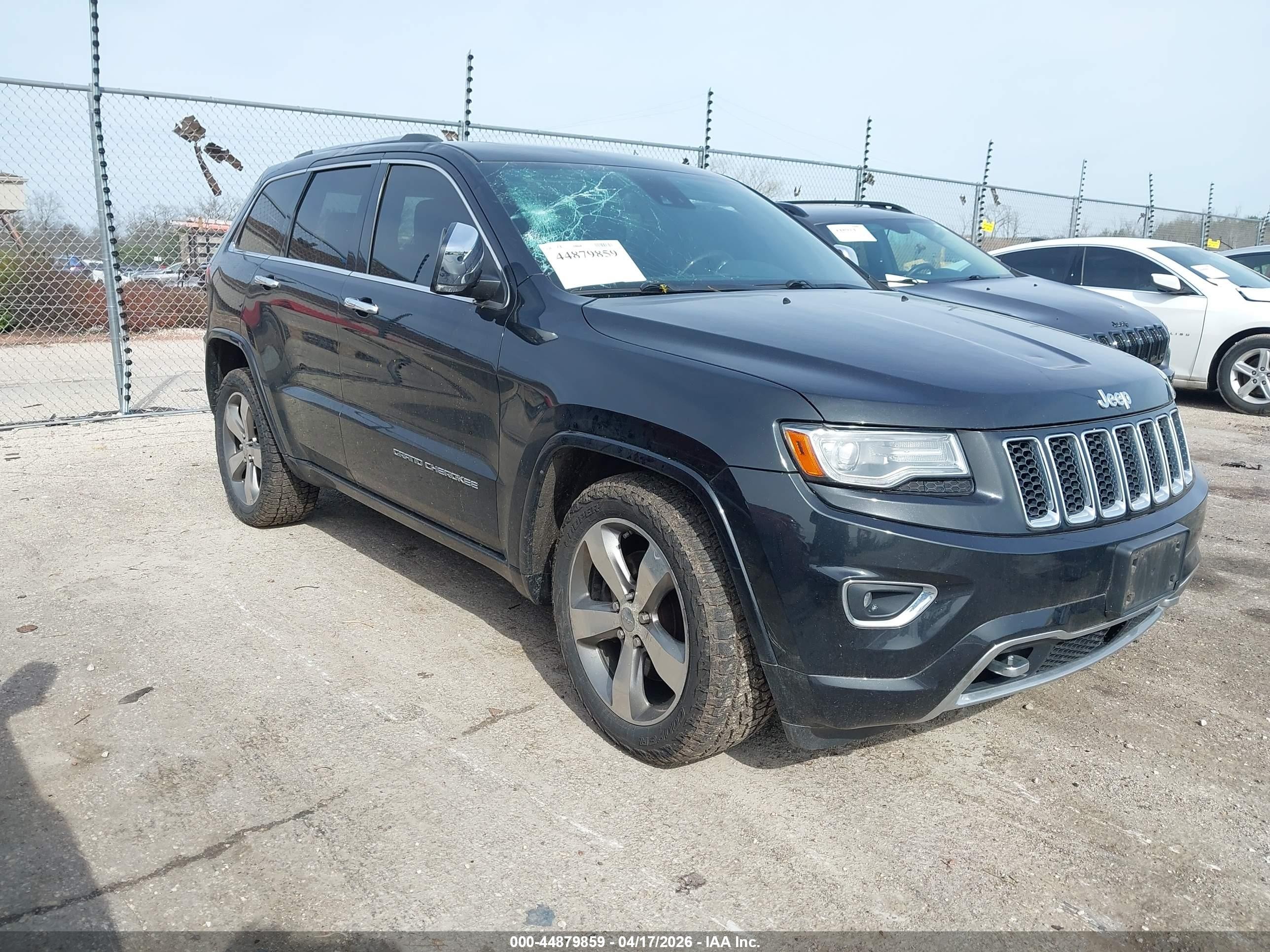 2014 Jeep Grand Cherokee Overland, VIN 1C4RJFCTXEC269982 — Storm