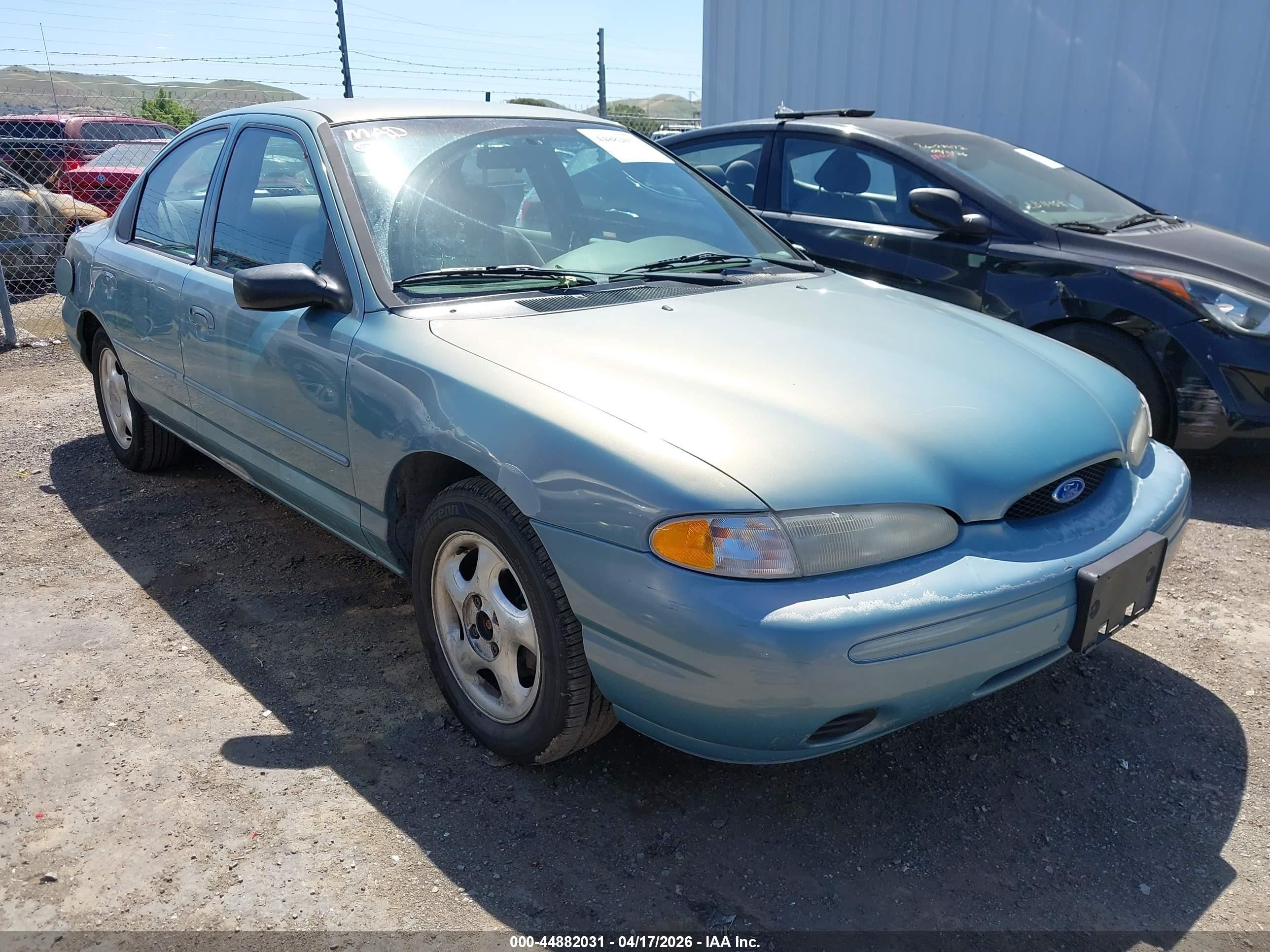 1996 Ford Contour GL, VIN 1FALP653XTK240153 — Side