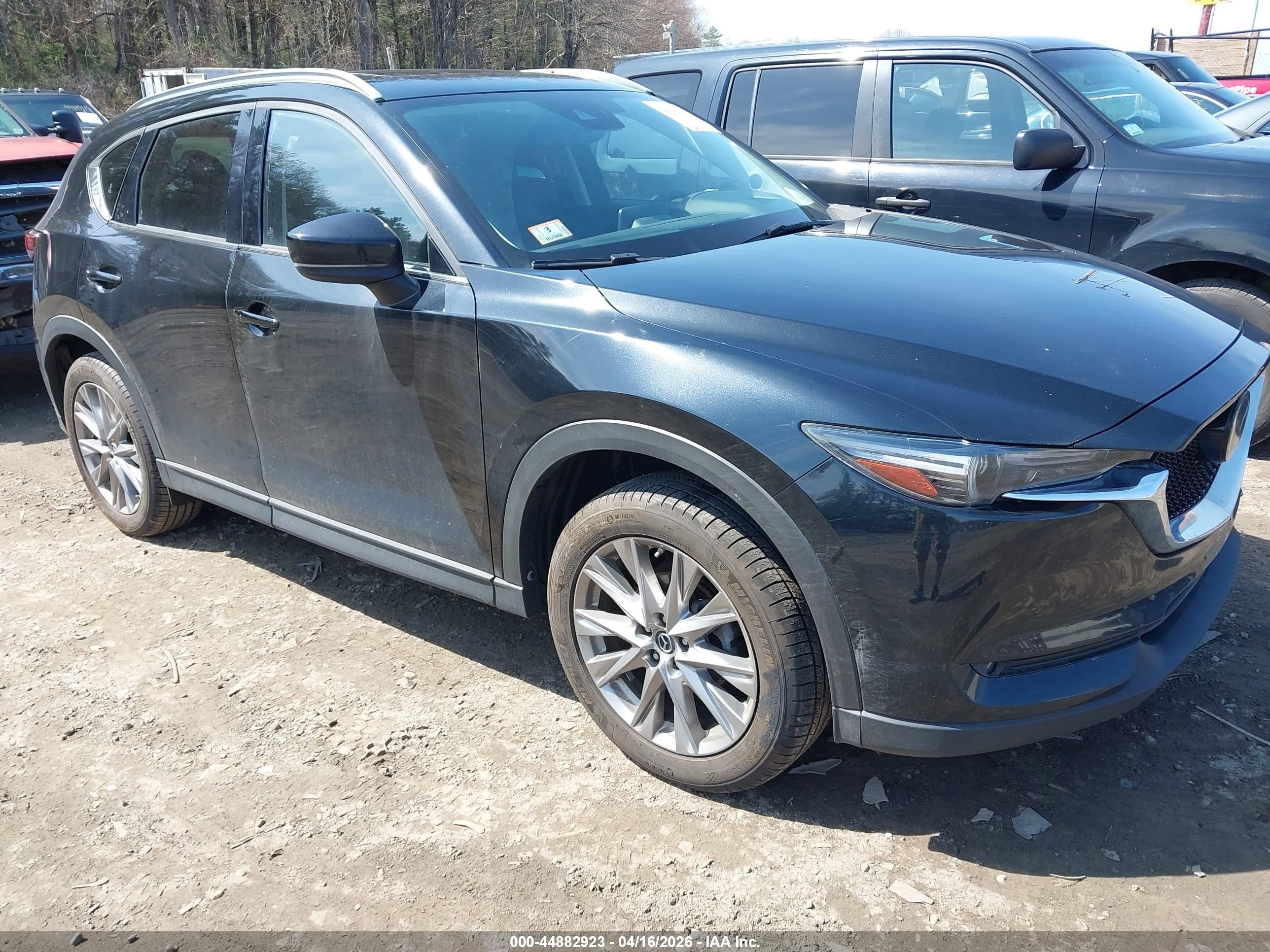 2020 Mazda CX-5 Grand Touring, VIN JM3KFBDM4L0748519 — Rear end