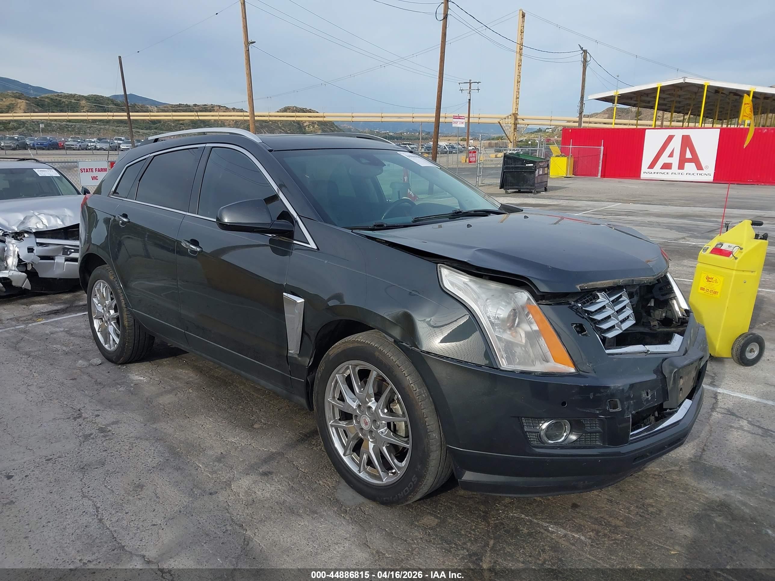 2014 Cadillac SRX Premium Collection, VIN 3GYFNDE32ES568024 — Front end