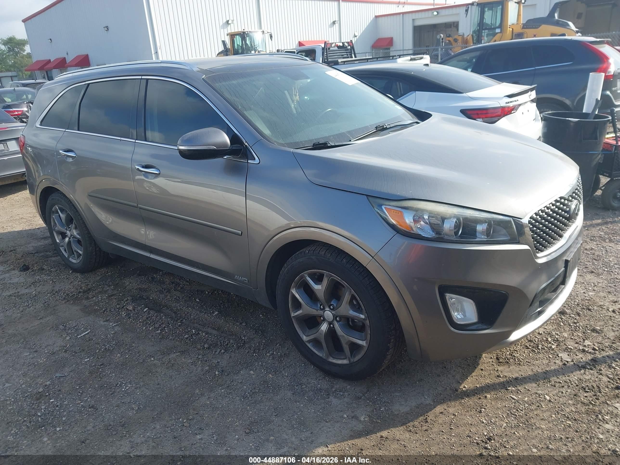2016 Kia Sorento SX, VIN 5XYPKDA54GG028673 — Side