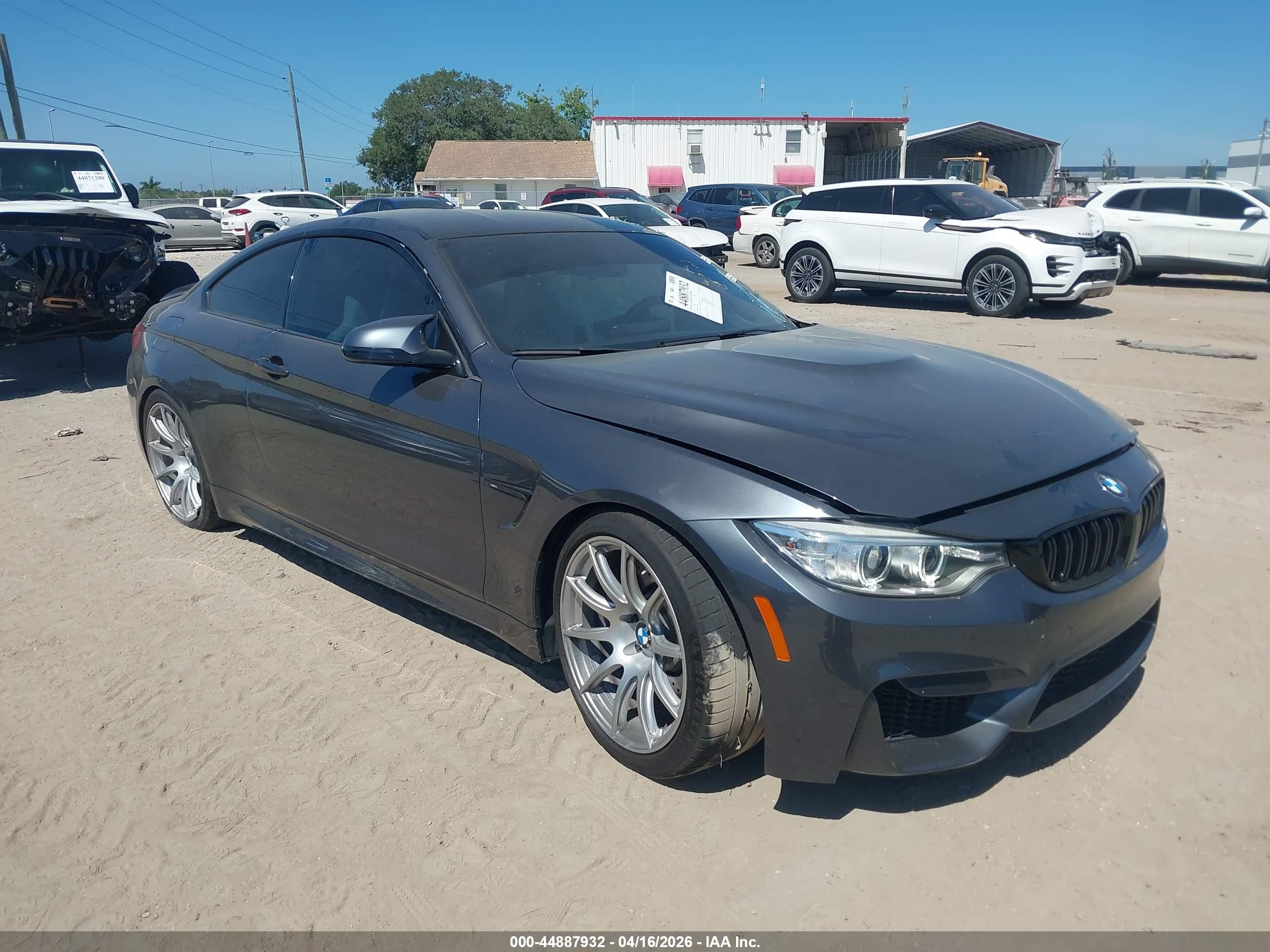 2015 BMW M4, VIN WBS3R9C59FK332457 — Side